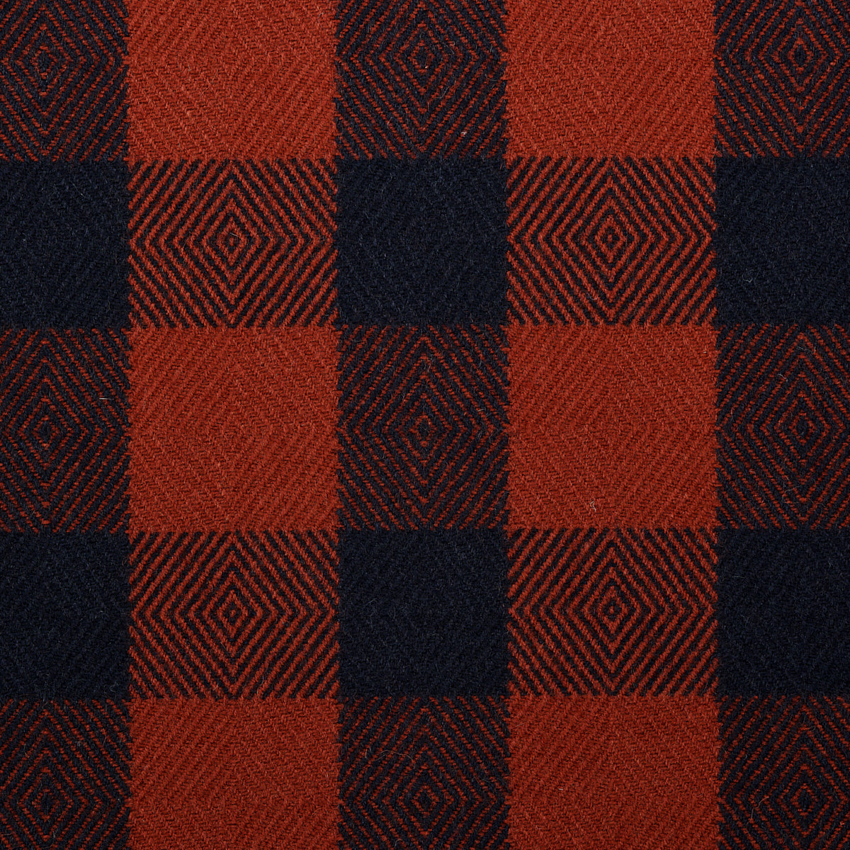 Rust-red and navy wool check woven fabric.