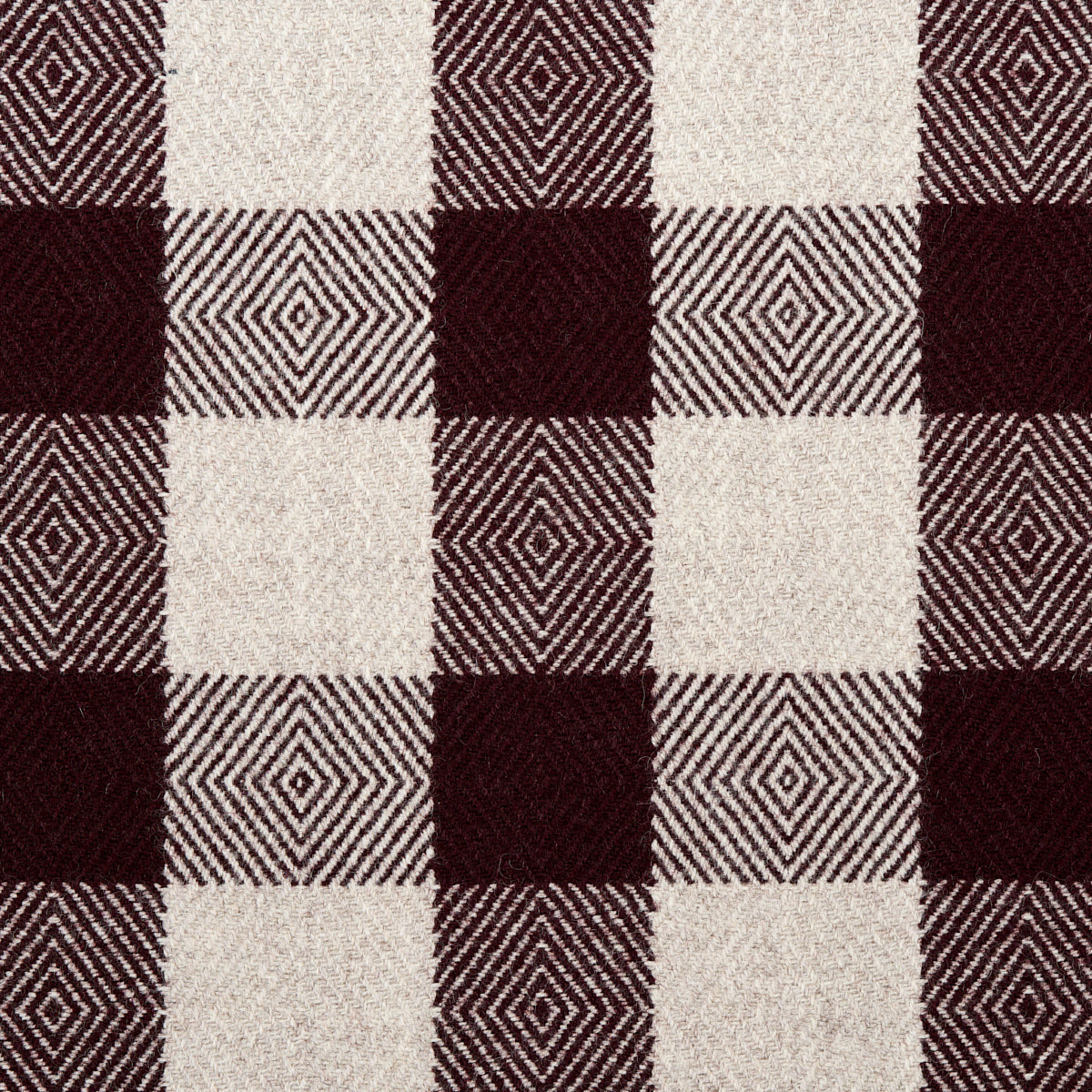 Maroon and cream plaid wool blanket with woven diamond accents in select squares.