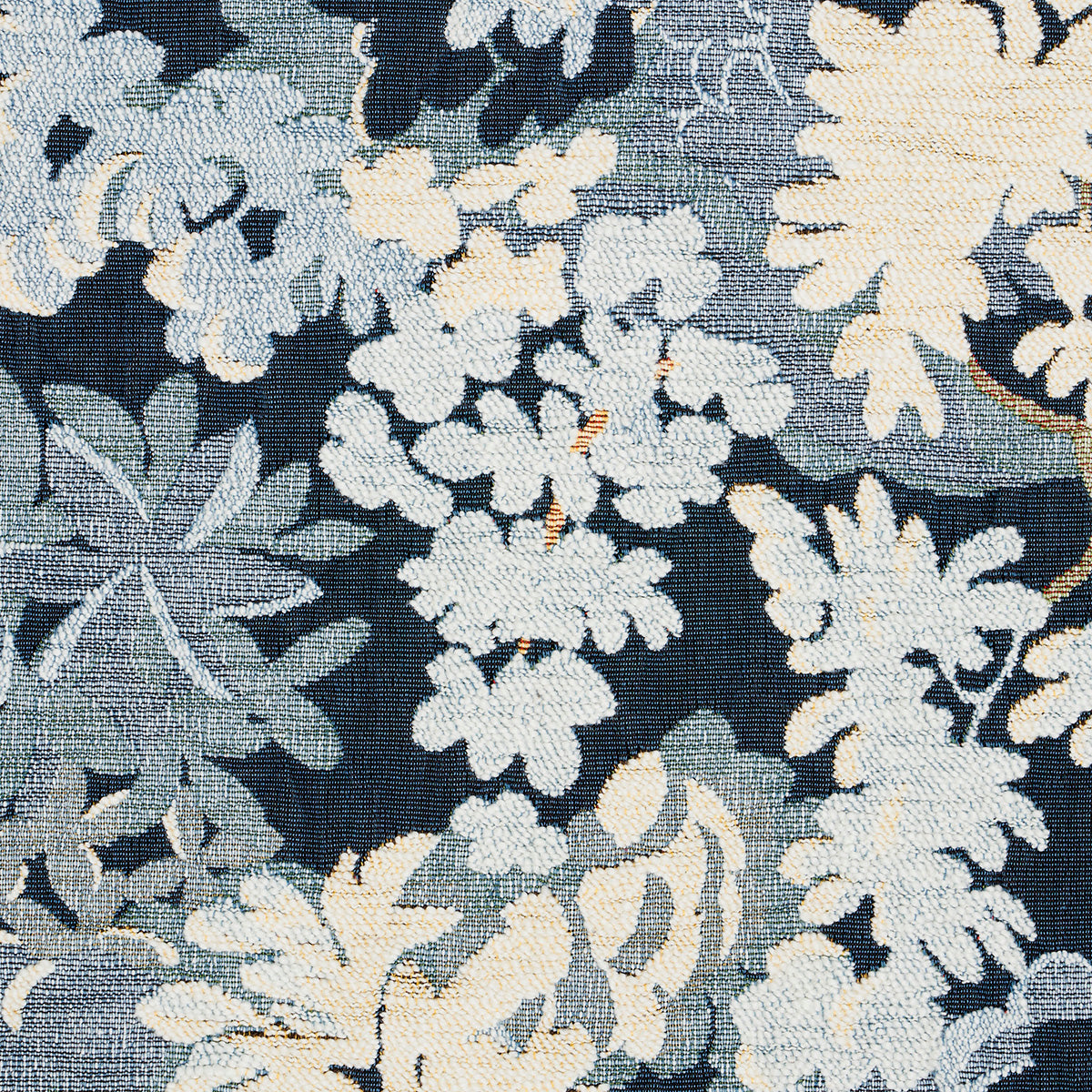 Dark navy fabric with cream and pale blue floral jacquard tapestry pattern.