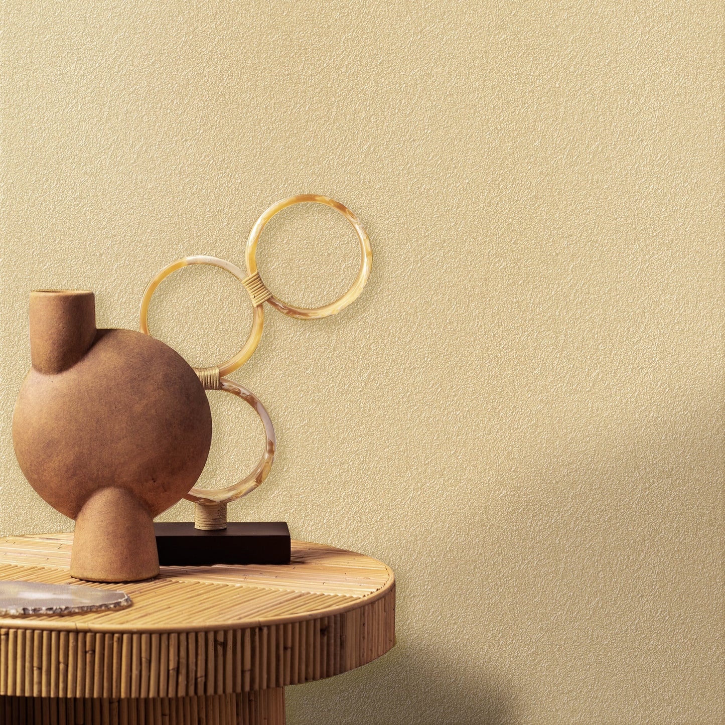 Beige wallpaper with a faux textile fiber texture and an abstract contemporary pattern.