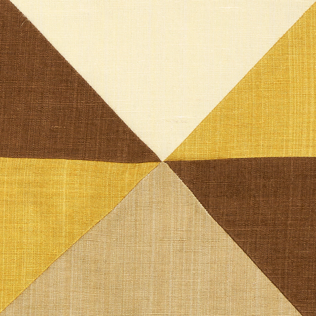 Woven textile rug featuring a four-triangle pinwheel in brown, tan, cream & yellow.