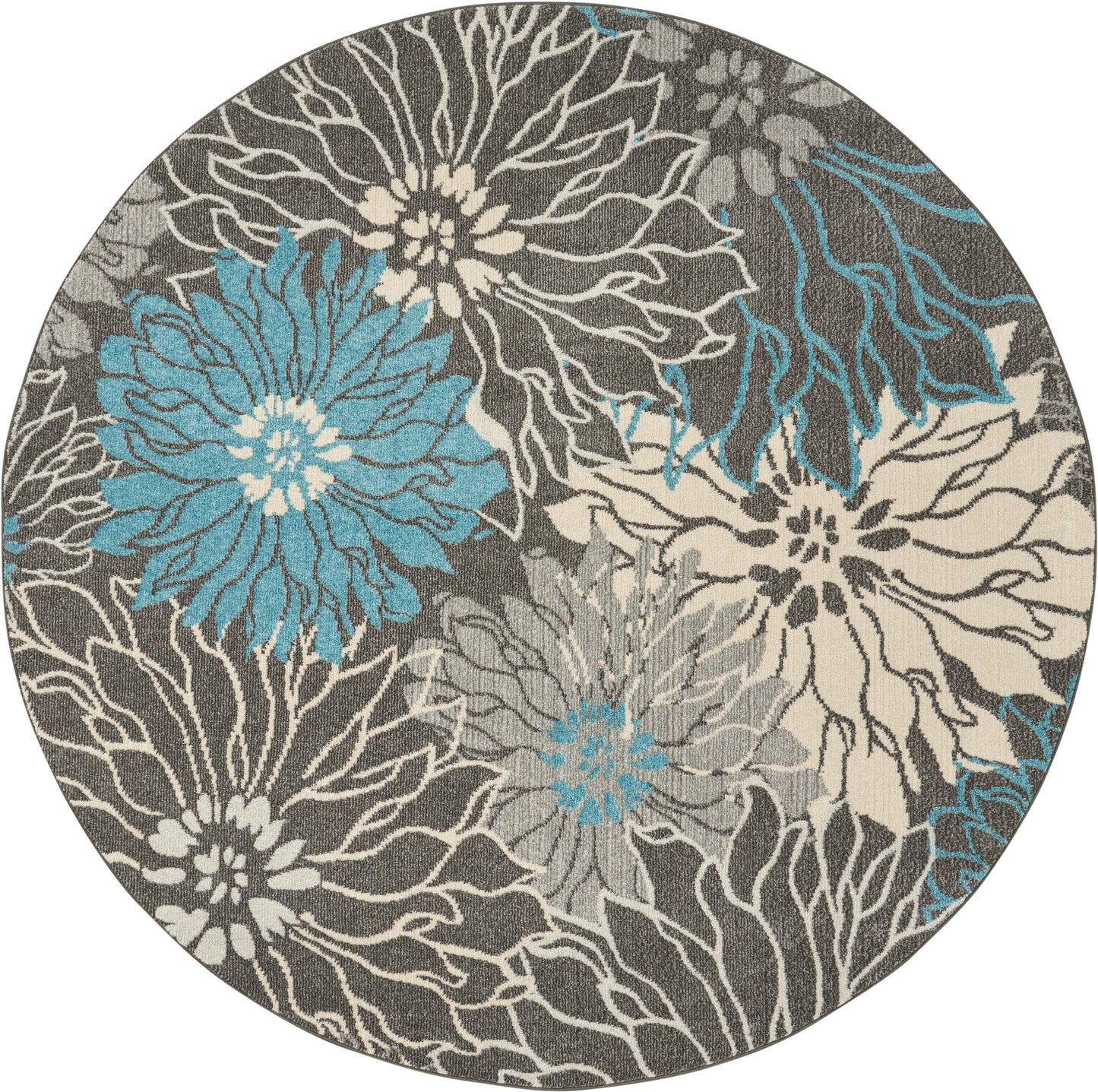 Round rug with teal blue and cream floral pattern on a gray backdrop; modern, textured botanical design.