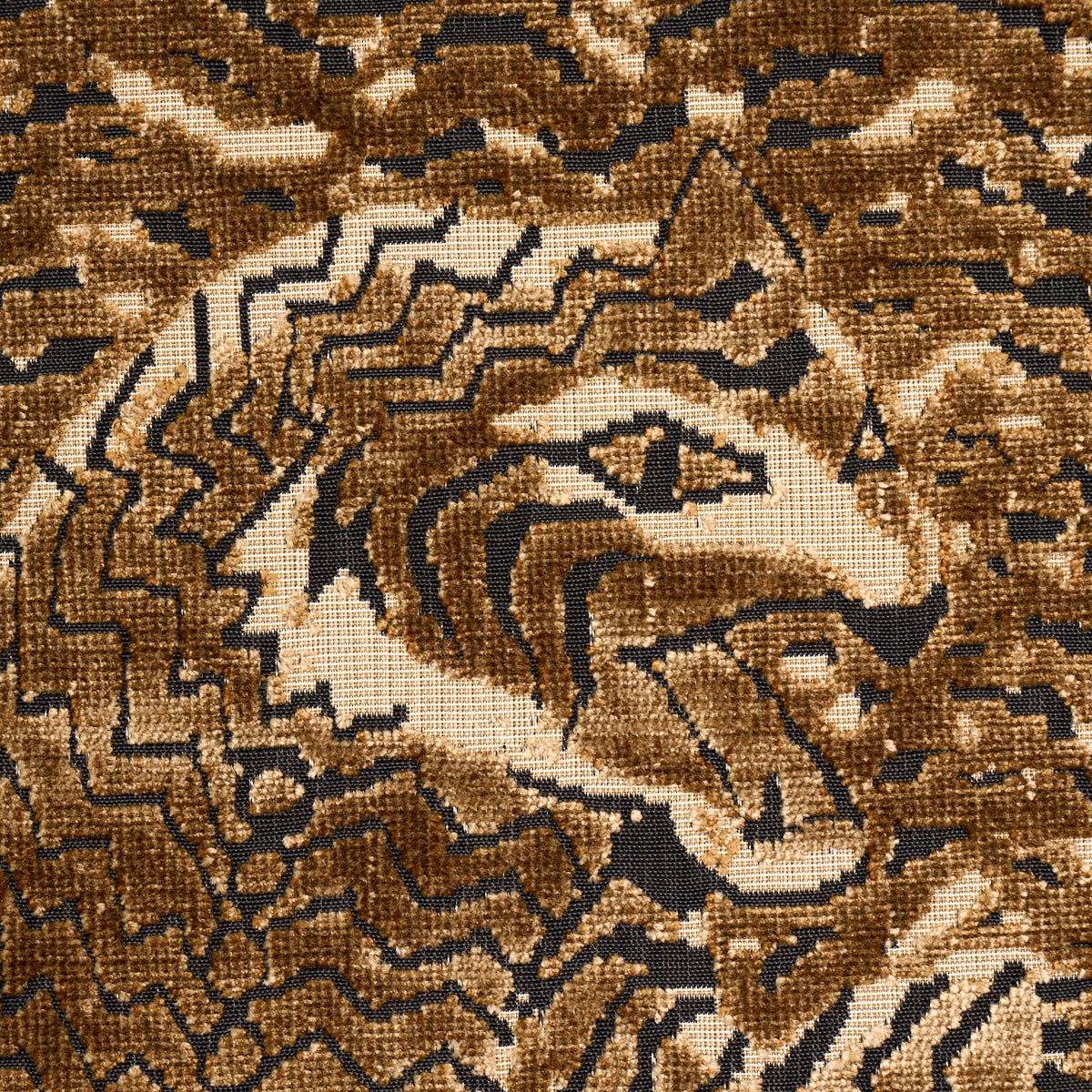 Brown, tan and black geometric zigzag woven rug with plush texture.