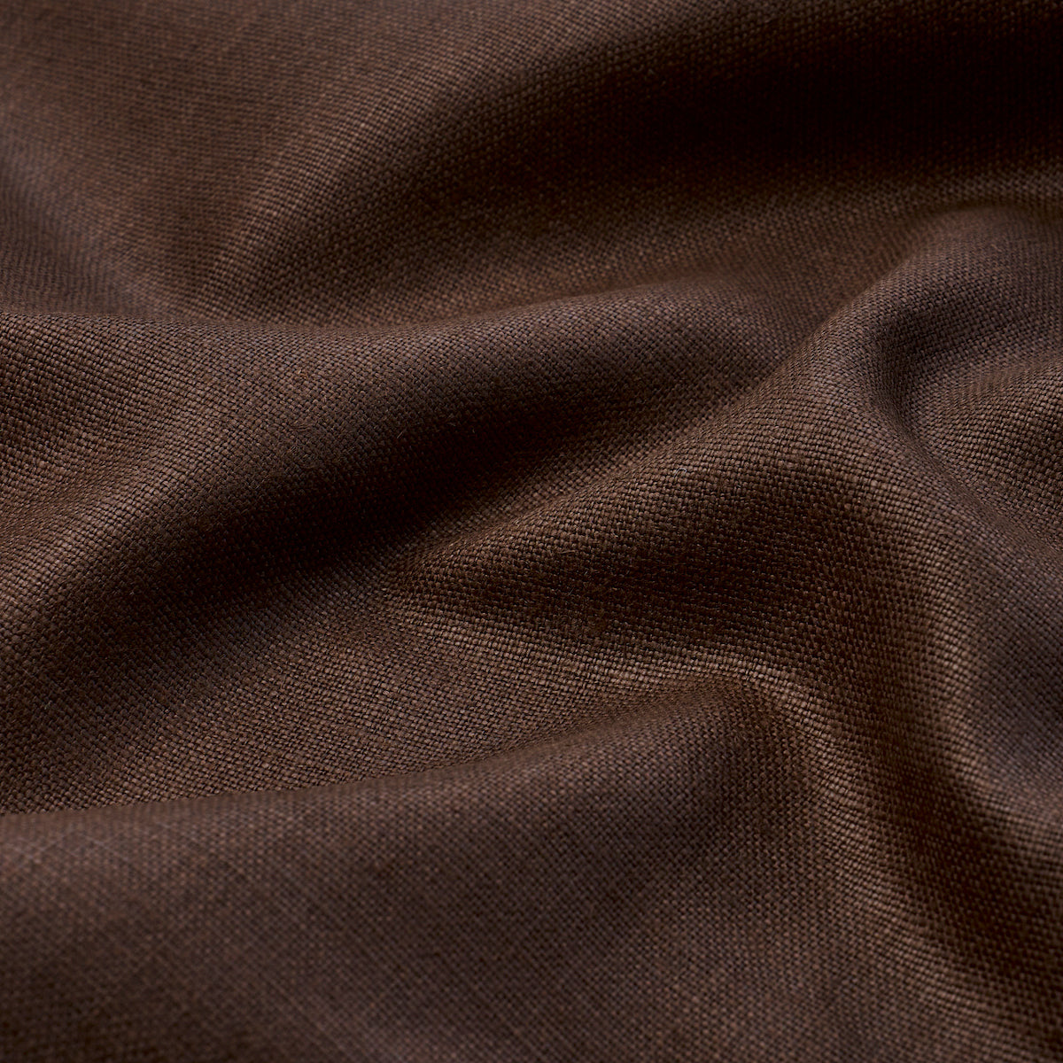 Dark brown linen-like fabric with fine weave and soft folds, versatile drapery or apparel material.