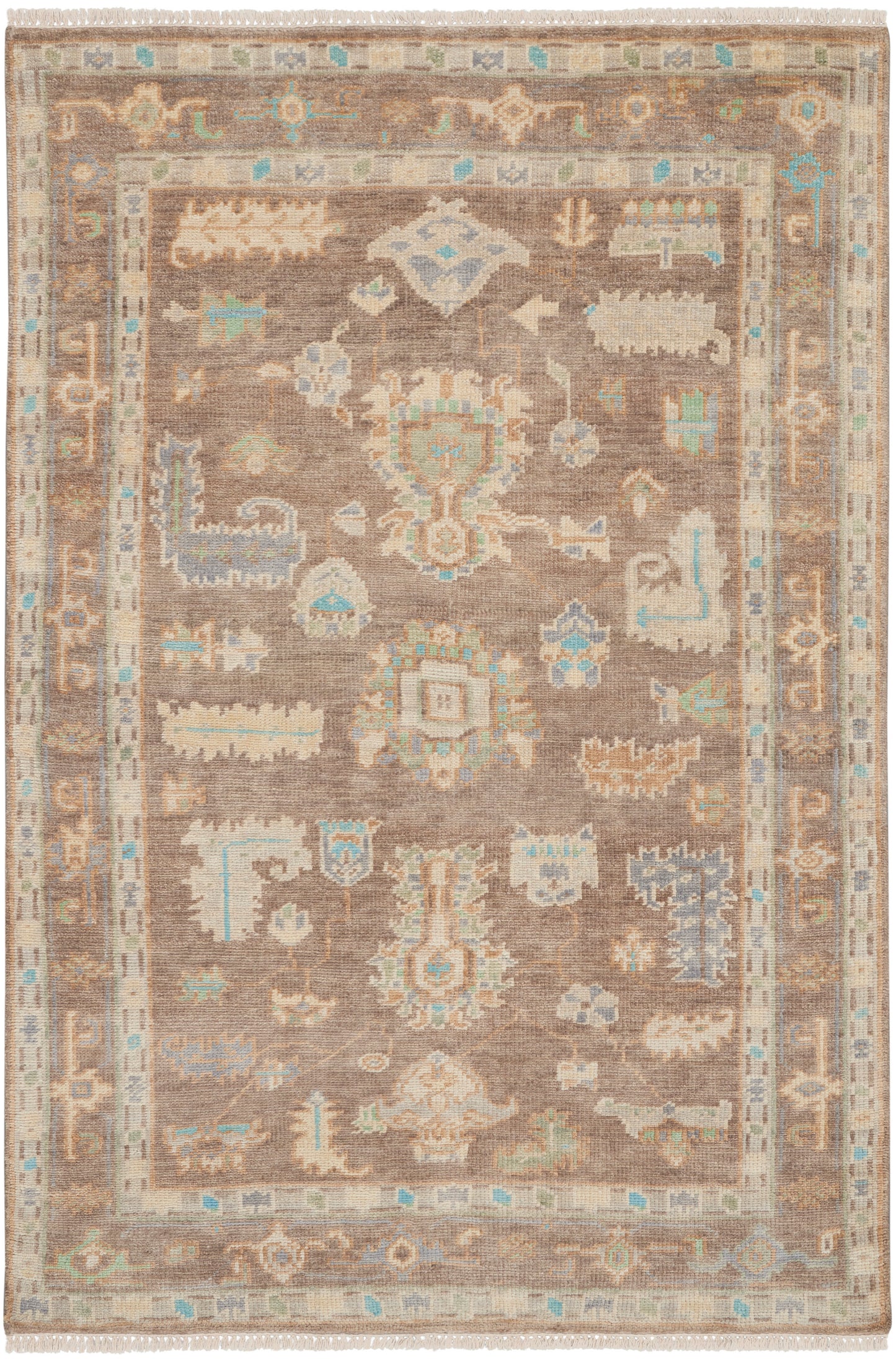 Brown oriental rug with cream border, teal and pastel blue accents, central medallion and geometric motifs, fringed ends.