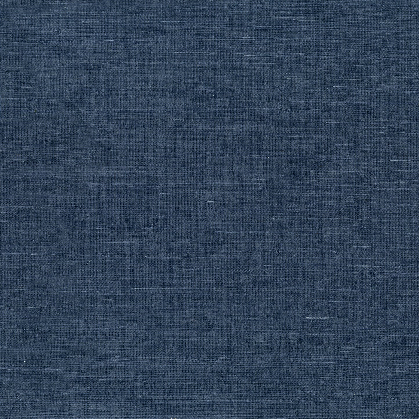 Navy blue grasscloth-style wallpaper swatch with linen-like texture and subtle flecks.