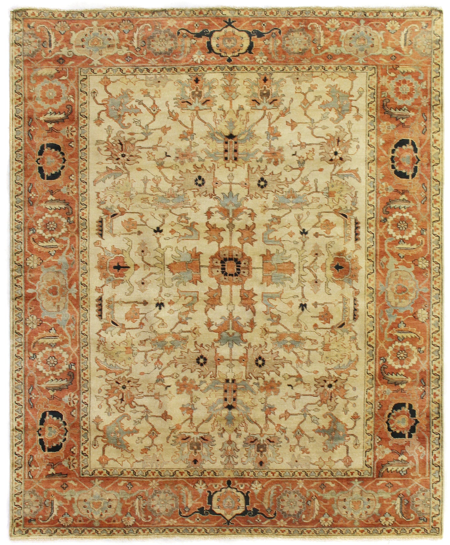 Elaborate beige area rug featuring floral and geometric patterns in muted orange, blue, and black tones. Traditional design.