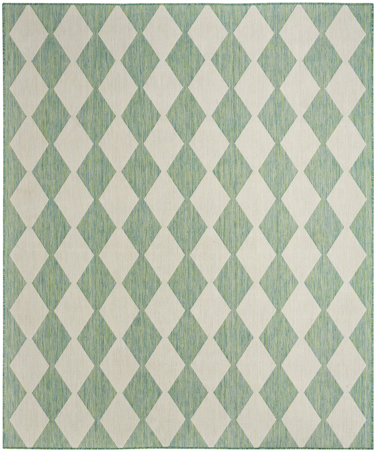 Mint-green woven rug with white diamond harlequin pattern and subtle striped texture.