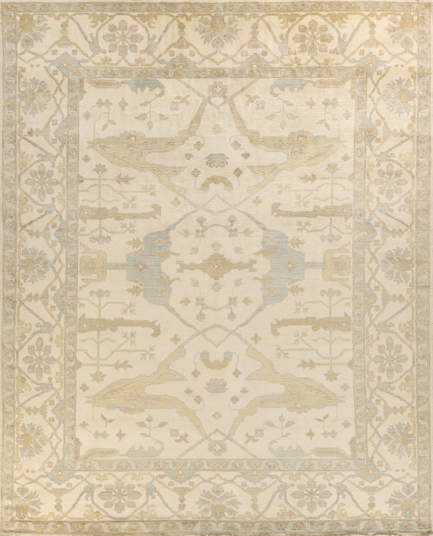 Ivory area rug with intricate floral patterns in soft beige and light blue. Traditional rectangular shape, luxurious texture.
