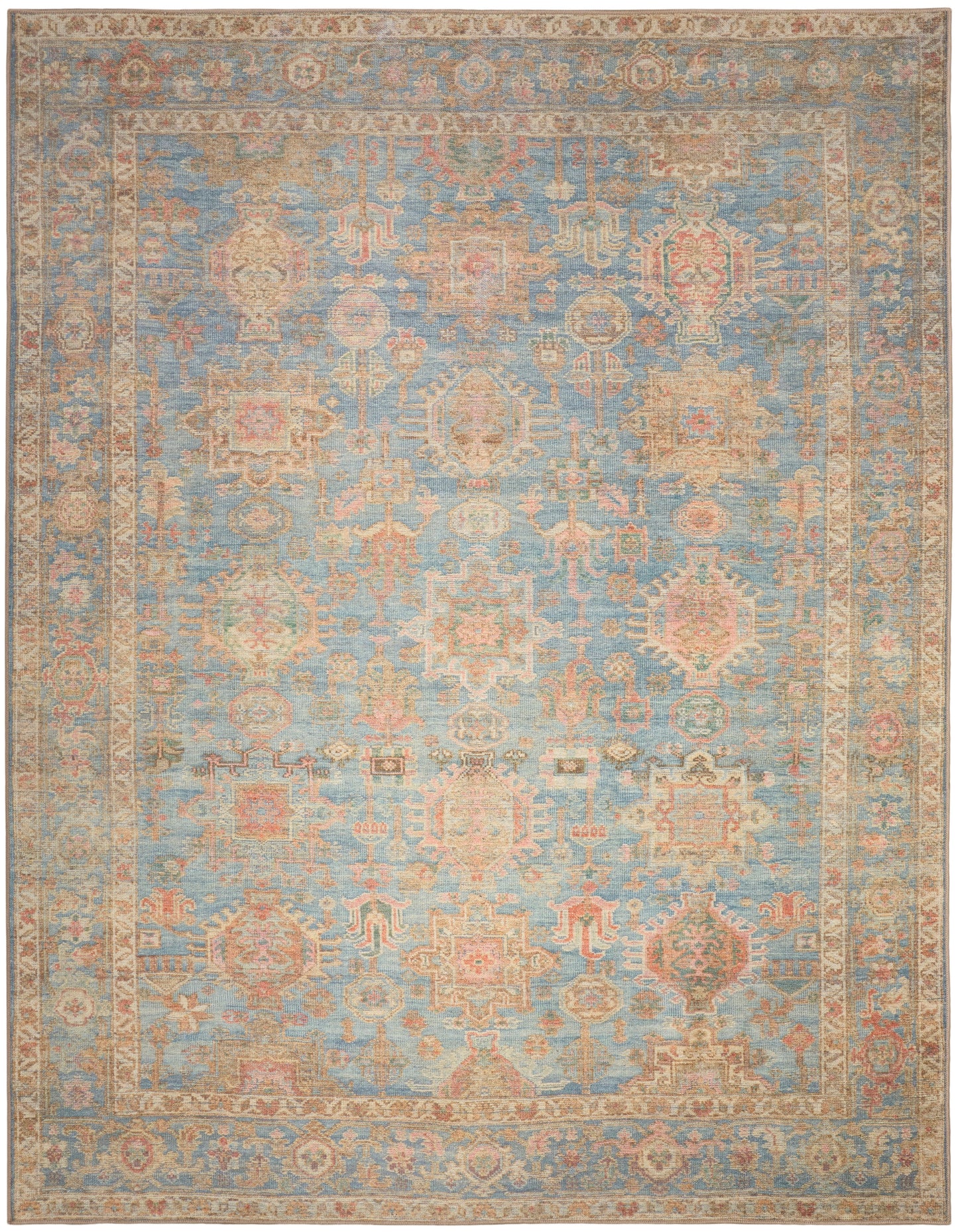 Rectangular blue and beige distressed Persian-style area rug with ornate floral motifs and decorative border.