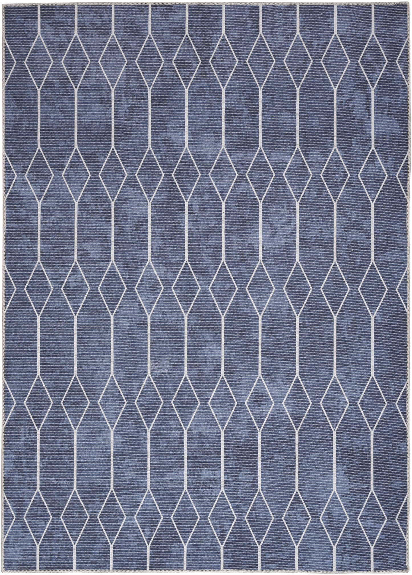Blue rectangular rug featuring a white diamond lattice trellis pattern on a mottled denim background.