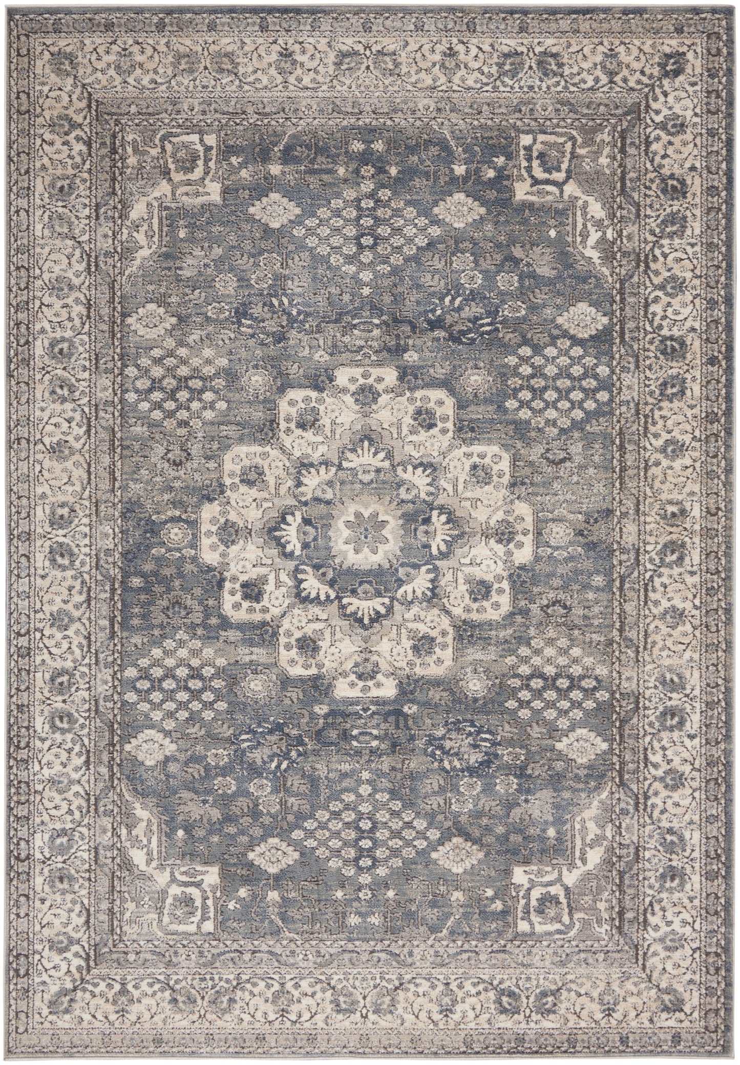Rectangular traditional oriental rug with blue-gray field, cream central medallion and ornate cream borders.