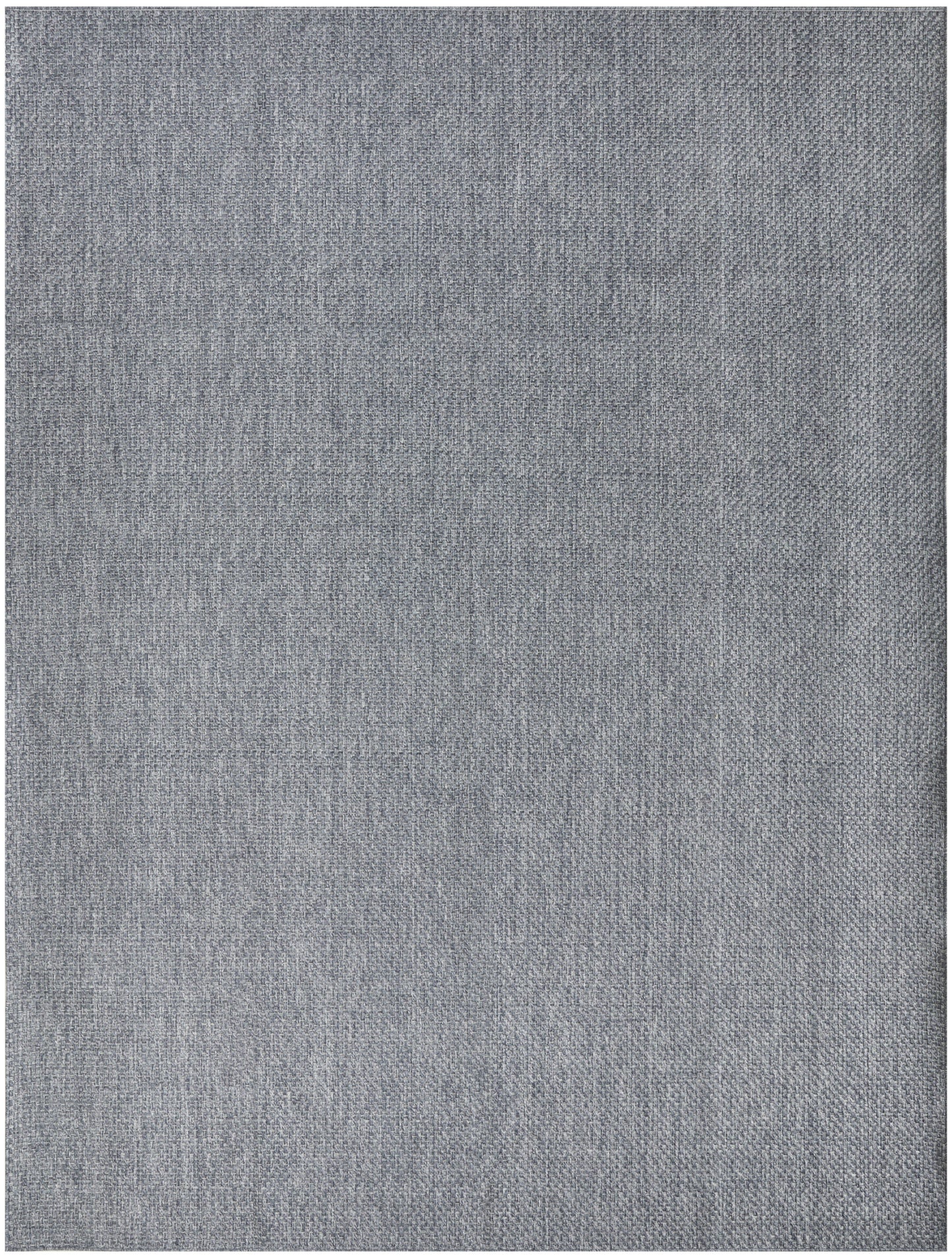 Grey woven fabric texture with a tight, heathered weave; outdoor rug.