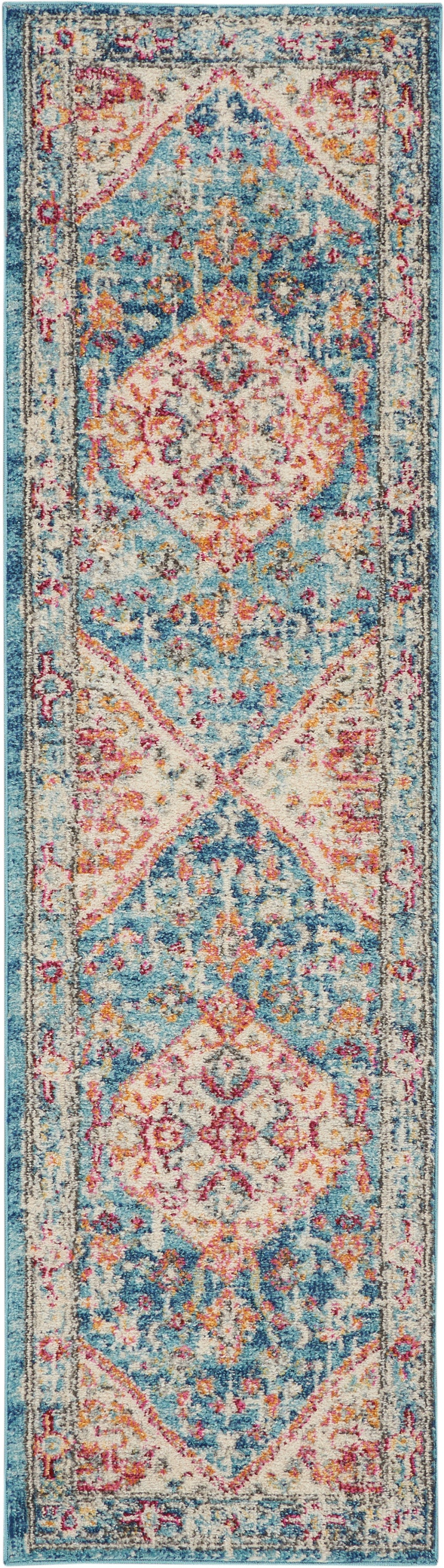 Turquoise runner rug with pink ivory medallions, floral border, distressed vintage Persian-inspired pattern.