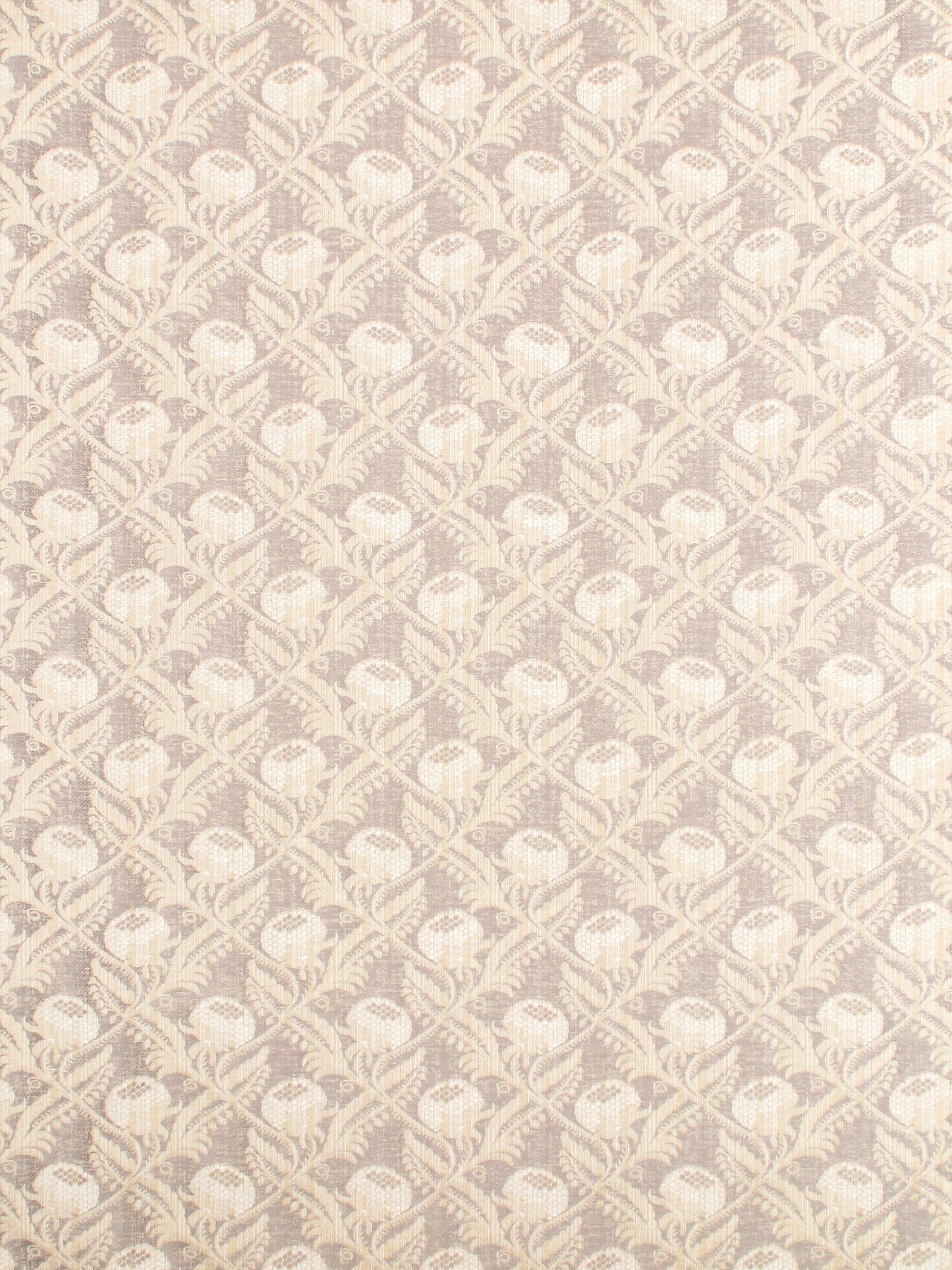Cream jacquard fabric with beige shell-like motifs in a repeating lattice pattern; woven upholstery/drapery textile.