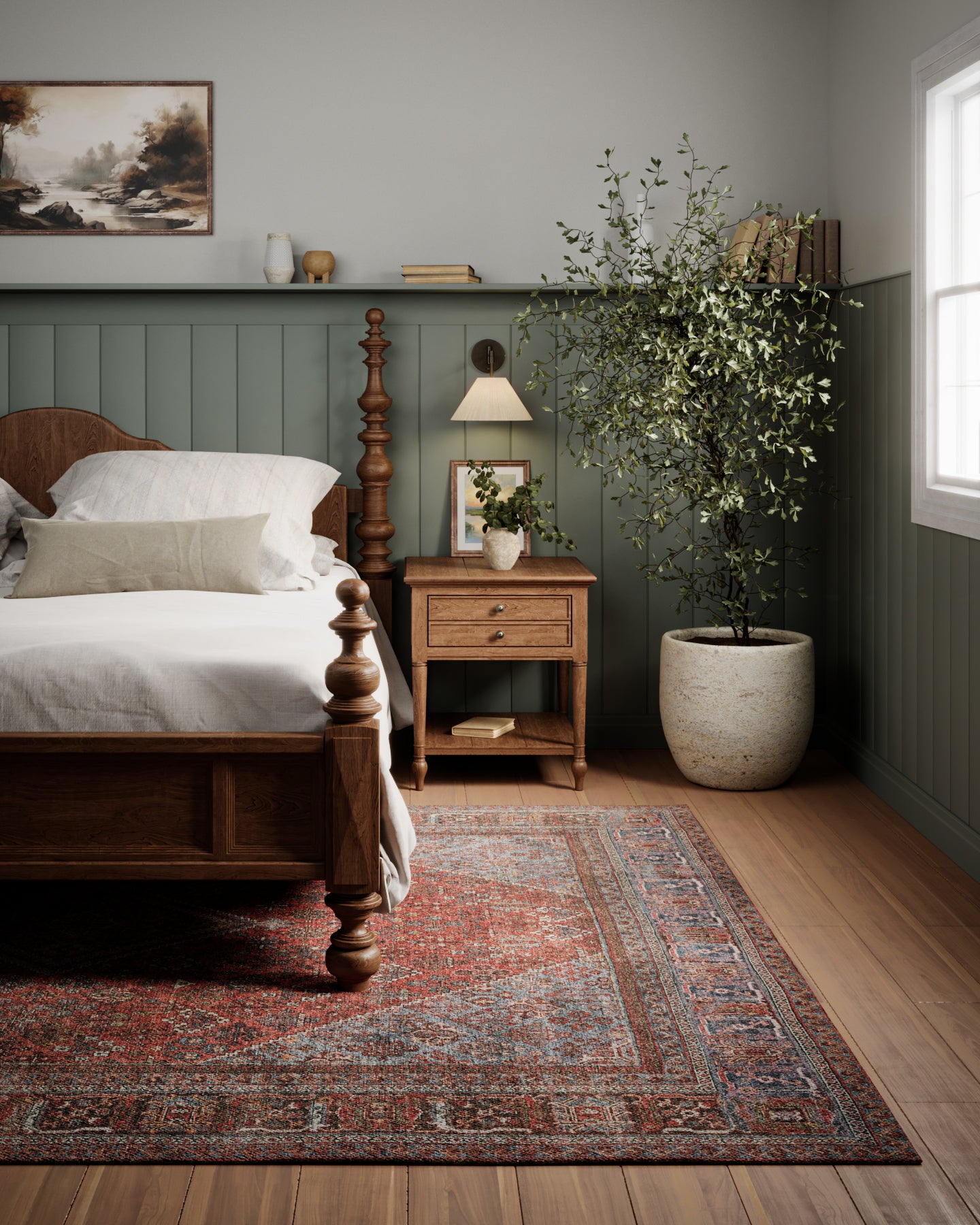 Persian rug on the floor in a bedroom scene, with a traditional wooden four-poster bed, white linens, nightstand, sage paneling, and a large potted tree.