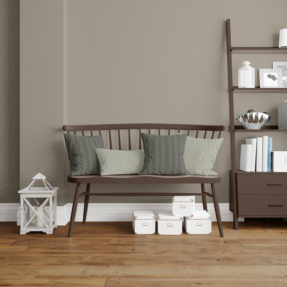 Oak Stripe textured fabric on gray and sage cushions on a mid-century brown wood bench, with a tall bookshelf and white storage boxes nearby.
