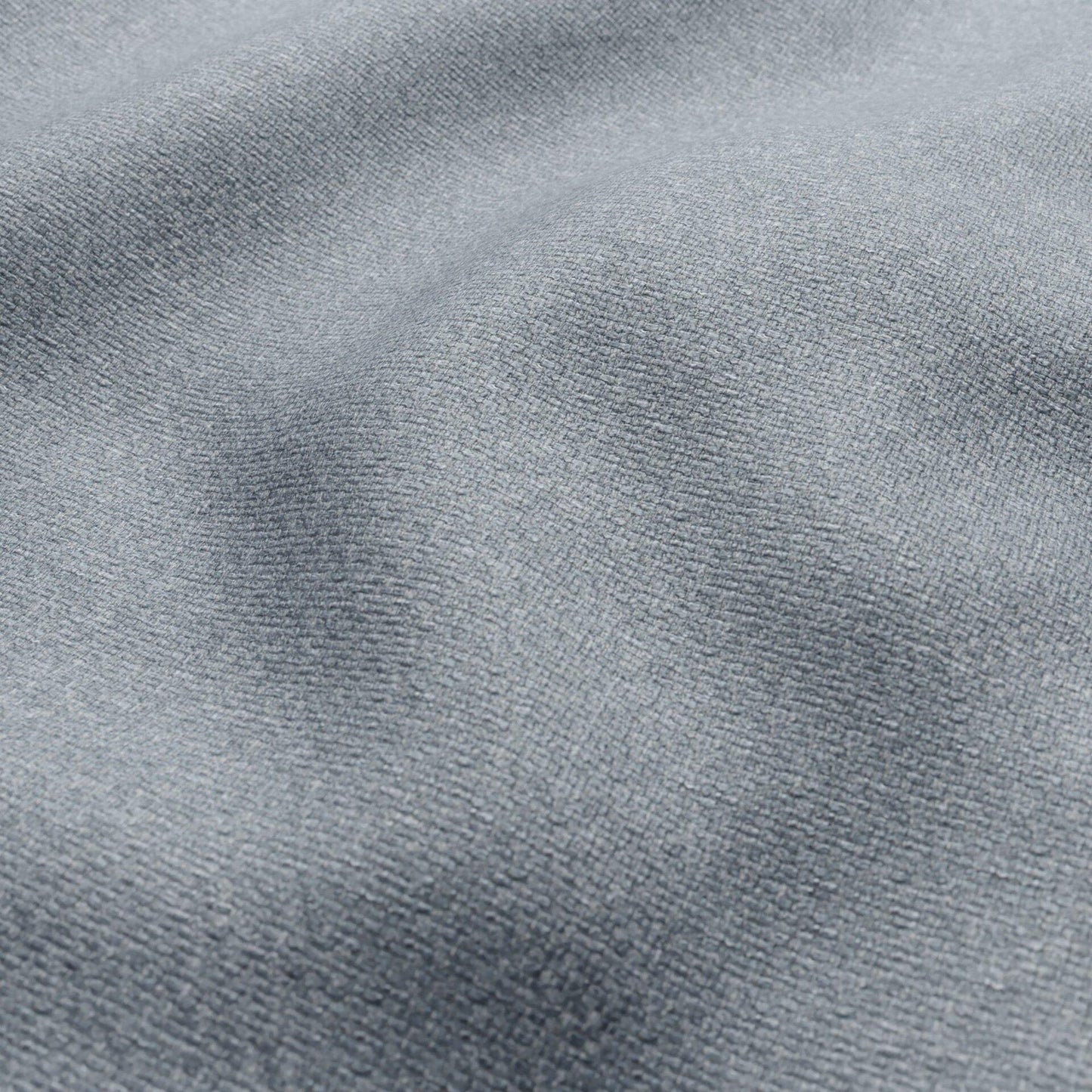 Blue basketweave fabric with a textured, woven surface.