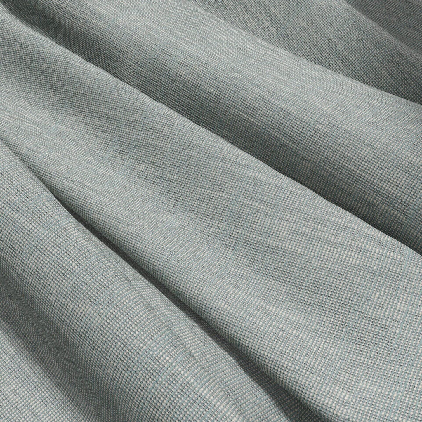 Green fabric with a textured weave, woven & sheer, draped in soft folds.