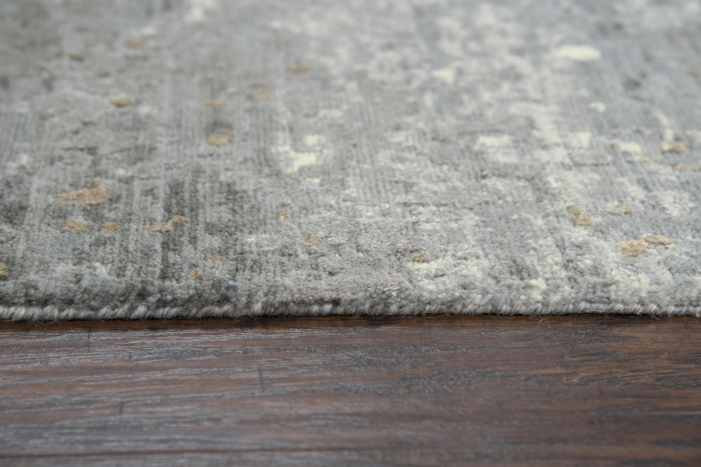 Contemporary rug, 2' x 10', with an abstract pattern in neutral tones.