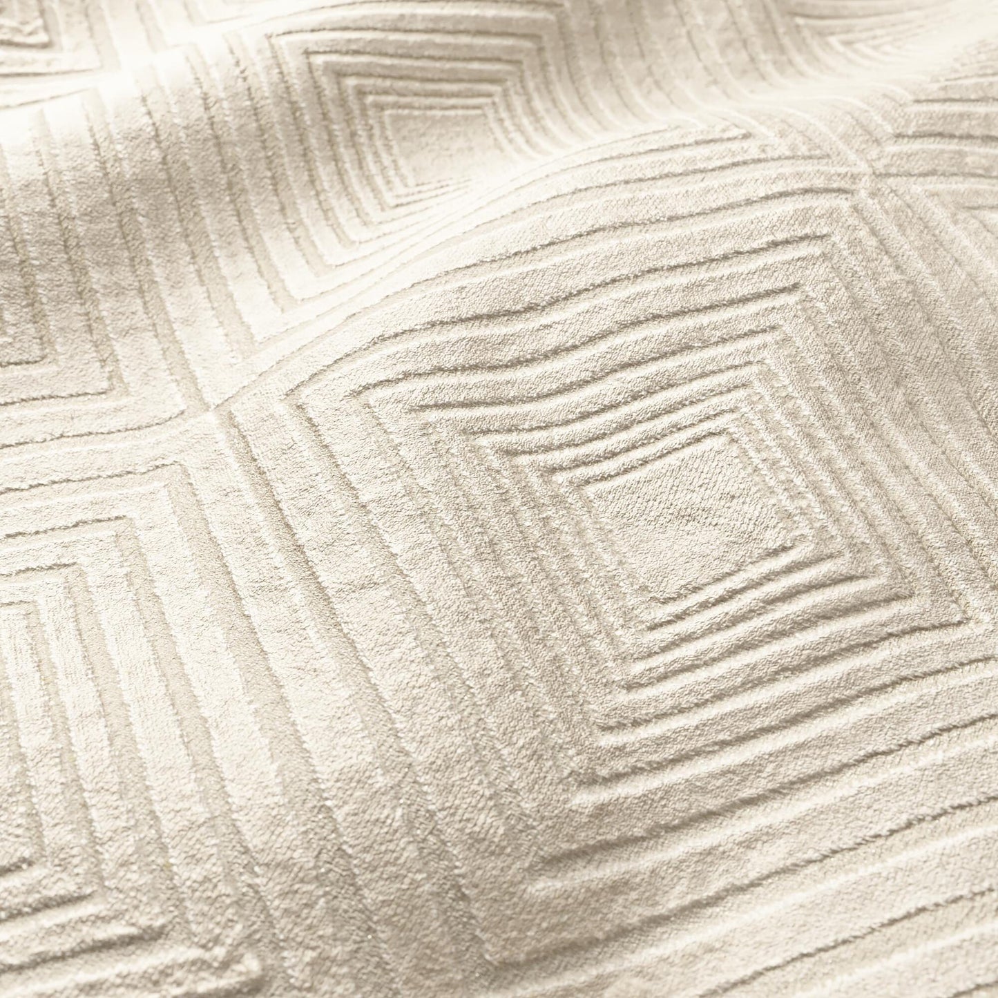 Beige plush velvet fabric with a raised geometric diamond pattern.