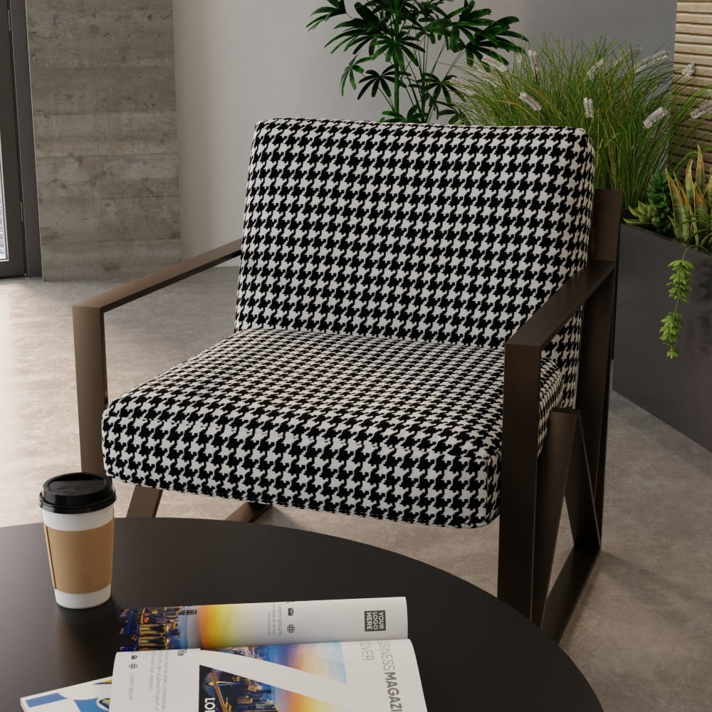 Dark wood-framed armchair with black-and-white houndstooth upholstery in a modern lounge with plants.