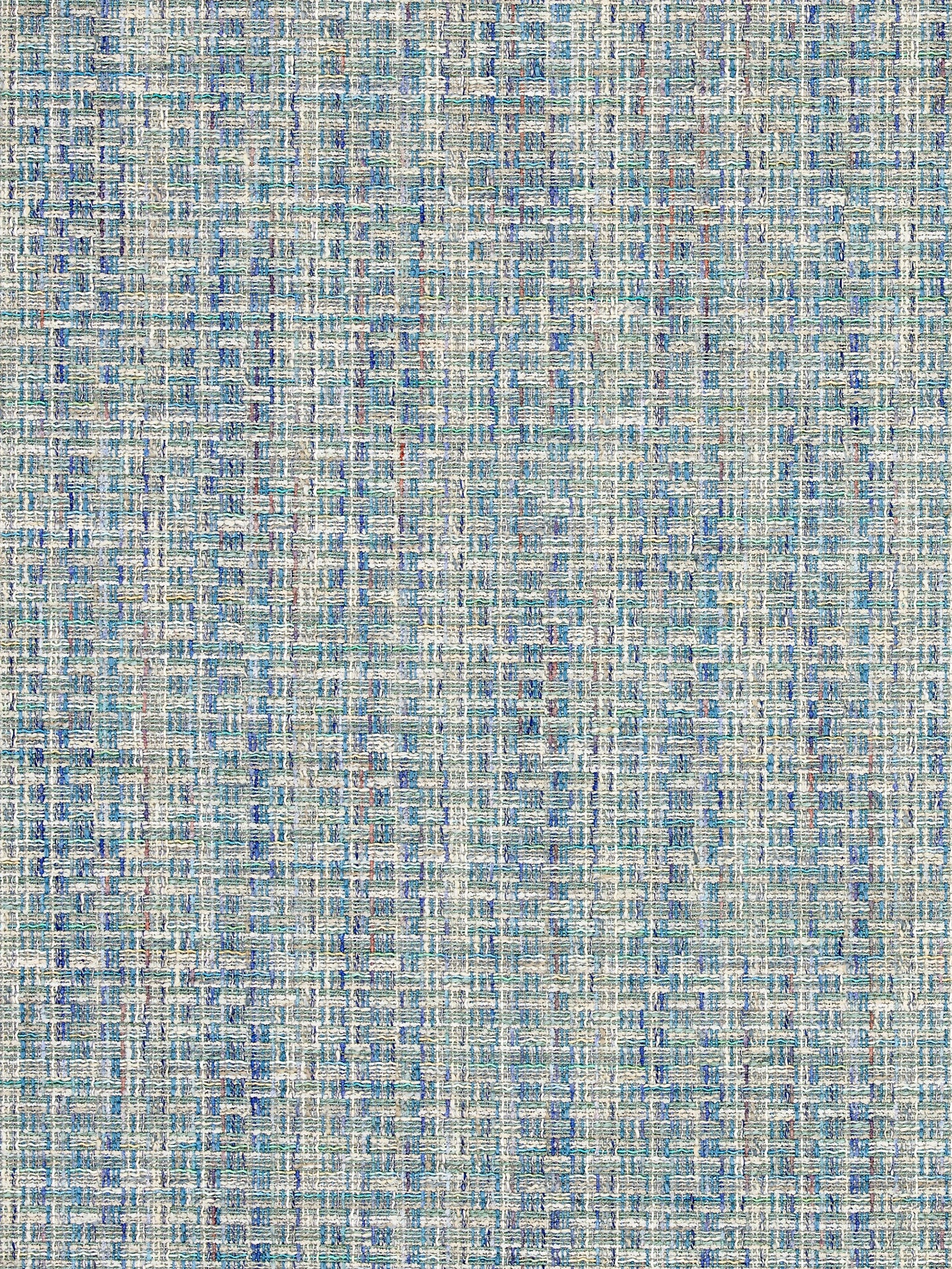 Cornflower blue woven fabric with a subtle speckled grid pattern & textured surface.