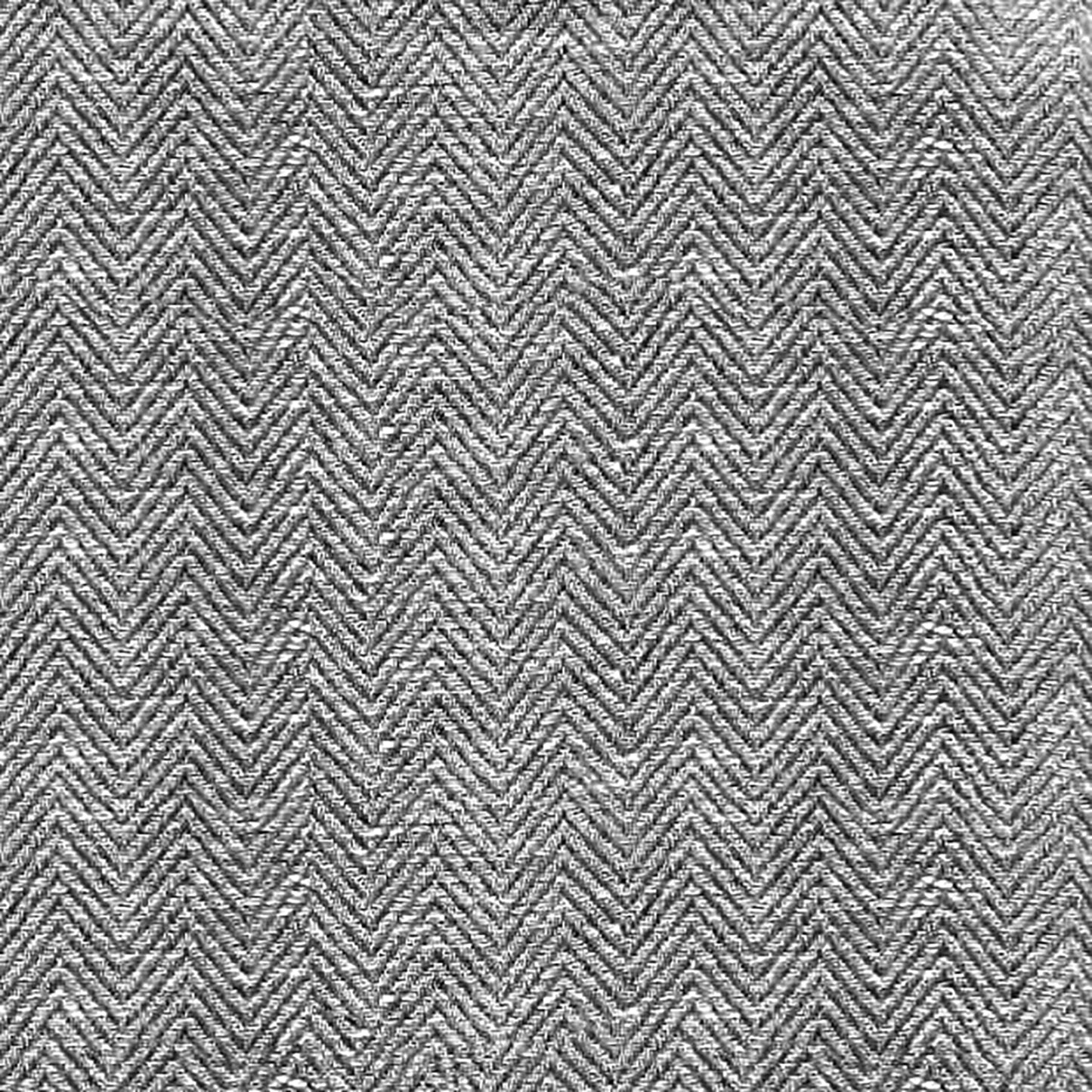 Black herringbone tweed fabric close-up with textured chevron weave.