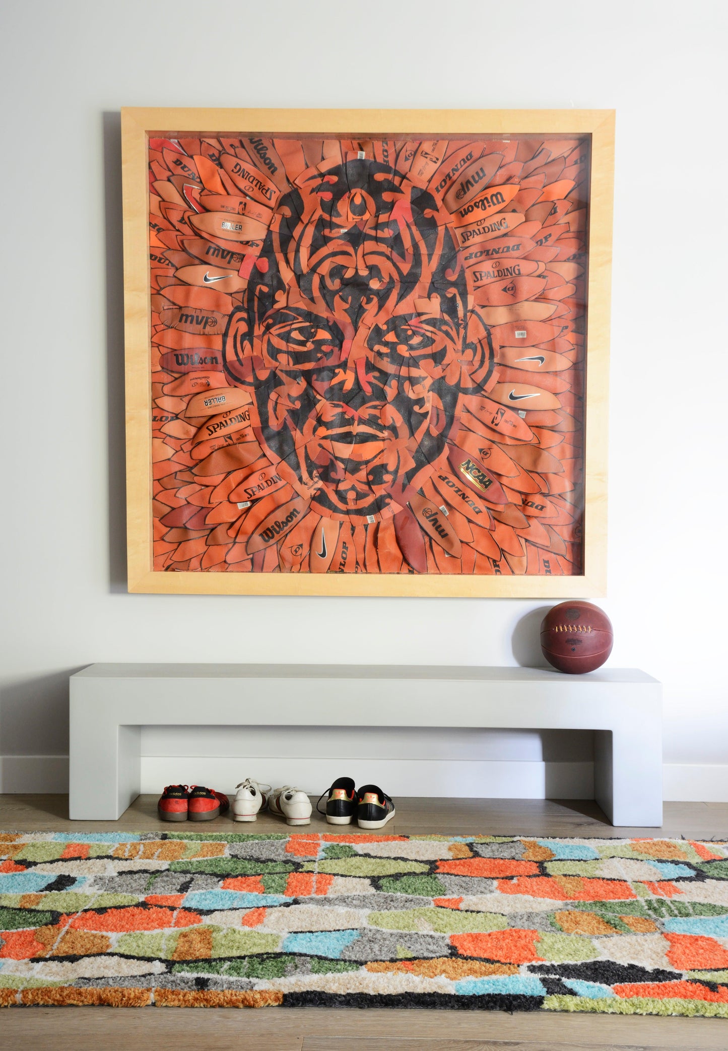 Large orange and black abstract geometric rug, 8' x 10'.
