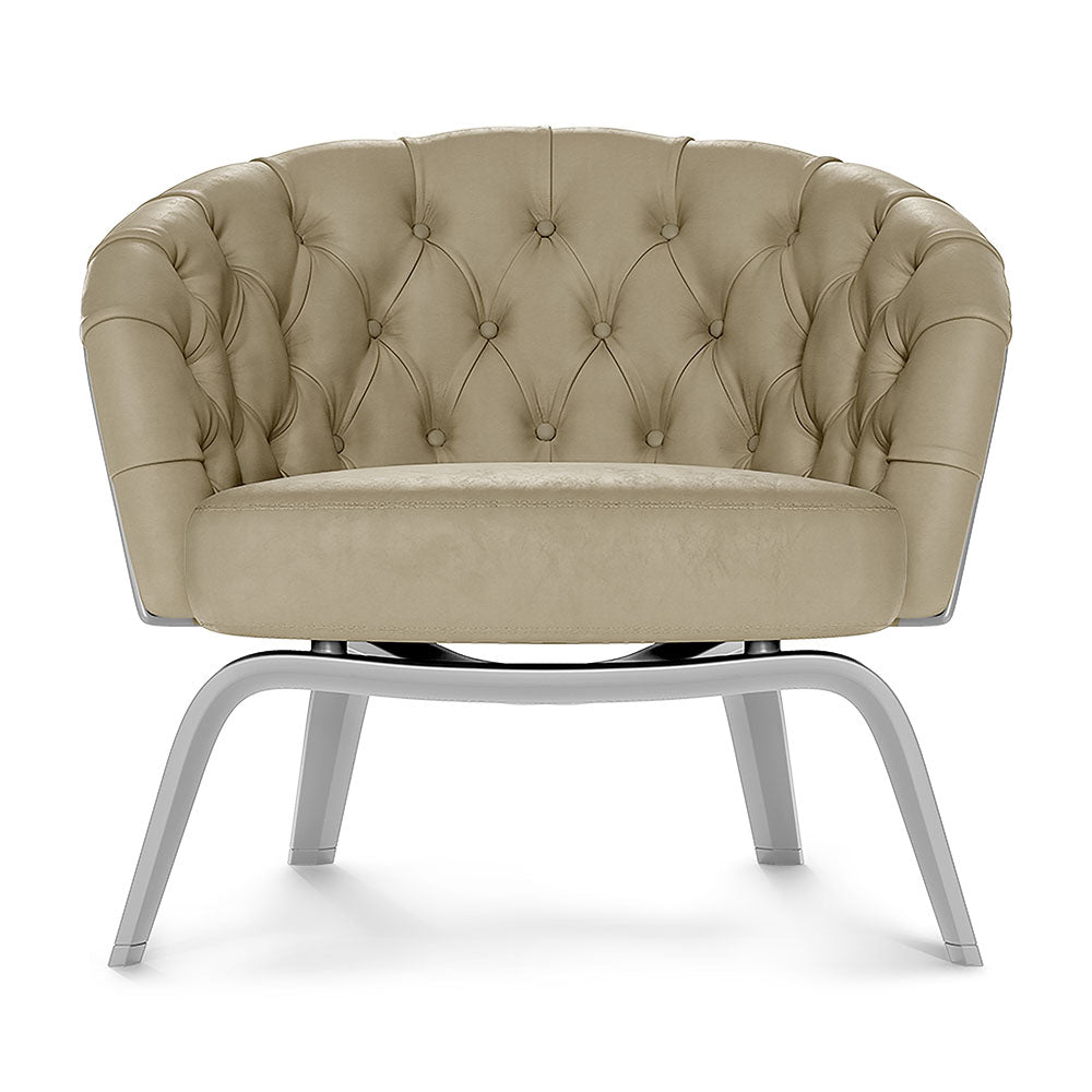 Beige tufted barrel lounge chair with metal curved legs, modern glam accent.