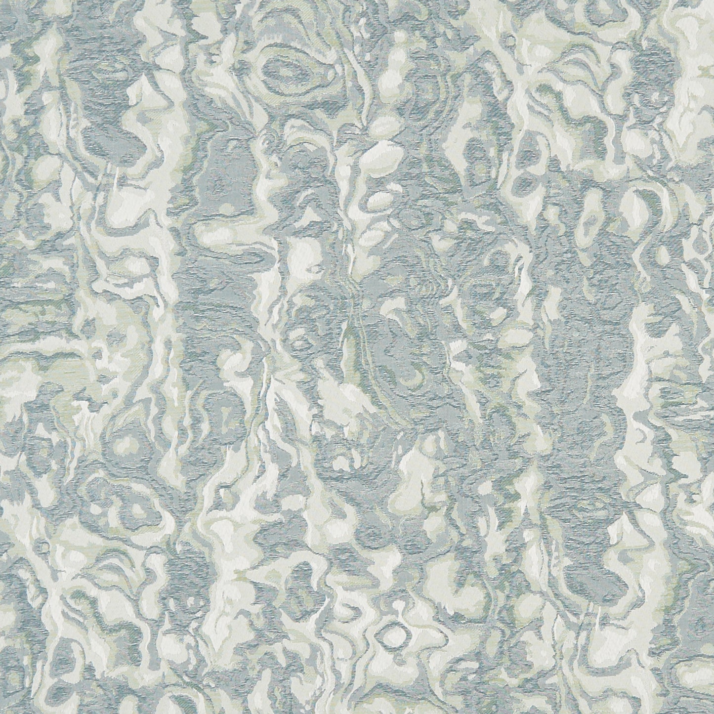 Caicos pattern: pale blue-gray and ivory marbled fabric texture with flowing organic swirls, suitable for upholstery or drapery.