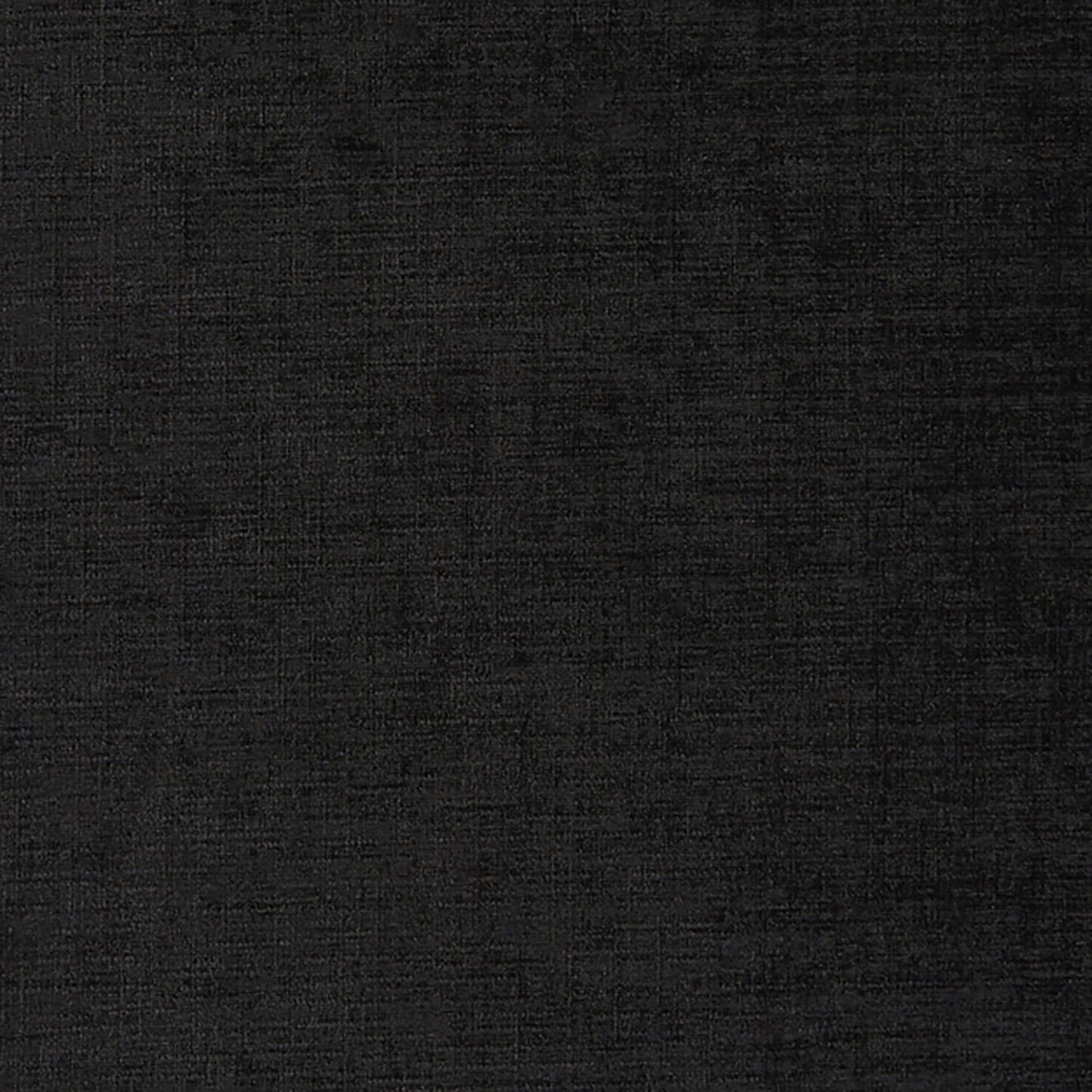 Close-up of black textured fabric with visible weave and matte finish.