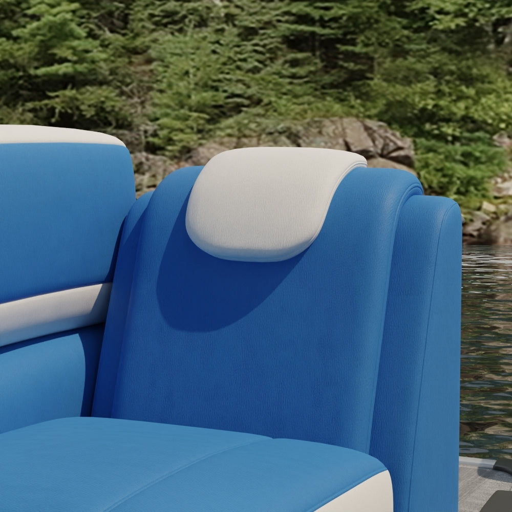 Blue solid fabric upholstery on a cushioned seat with a white padded headrest, lakeside scene with green trees in the background.