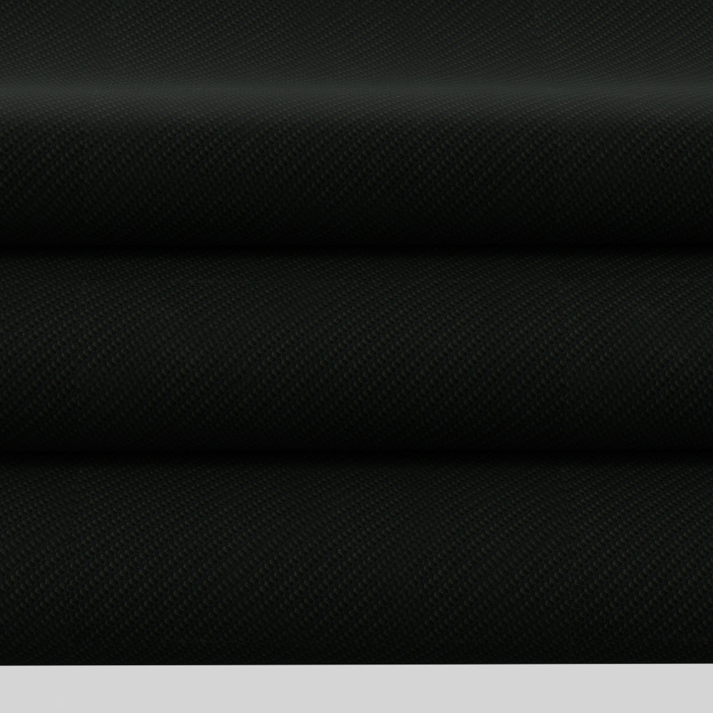 Three stacked black carbon-fiber textured fabric rolls with diagonal weave for automotive or tech use.