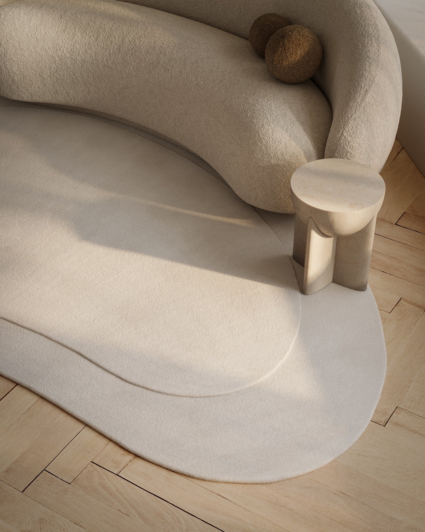 Cream plush curved rug on light wood floor in a modern minimalist lounge.
