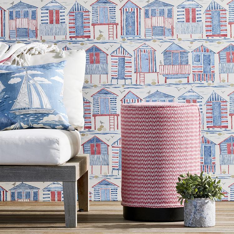 Coastal Beach Huts Nautical wallpaper by Sanderson featuring vintage illustrated seaside beach huts in soft blue and neutral tones, inspired by British coastal holidays, perfect for beach house decor, coastal living rooms, nautical bedrooms, feature walls, luxury interior design, and high-end home decor styling