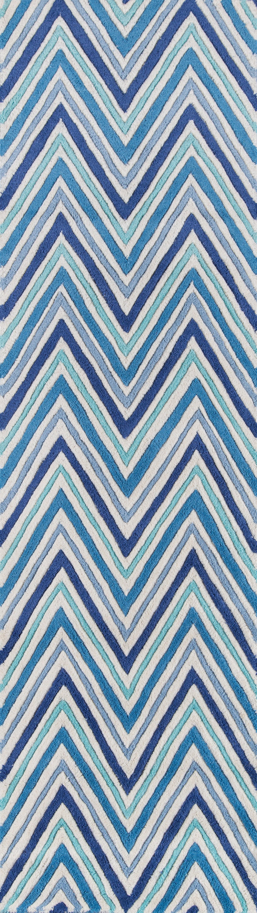 Blue chevron patterned rug with navy, sky blue and teal zigzag stripes.