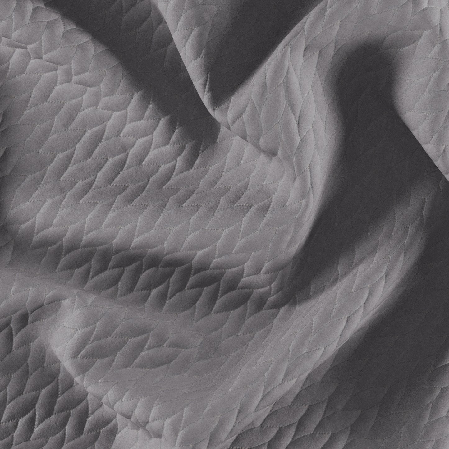 Gray velvet quilted fabric with a diamond stitch pattern.