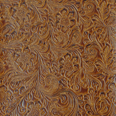 Intricate embossed floral pattern on rich, warm brown vinyl/faux leather, perfect for upholstery or crafting projects.