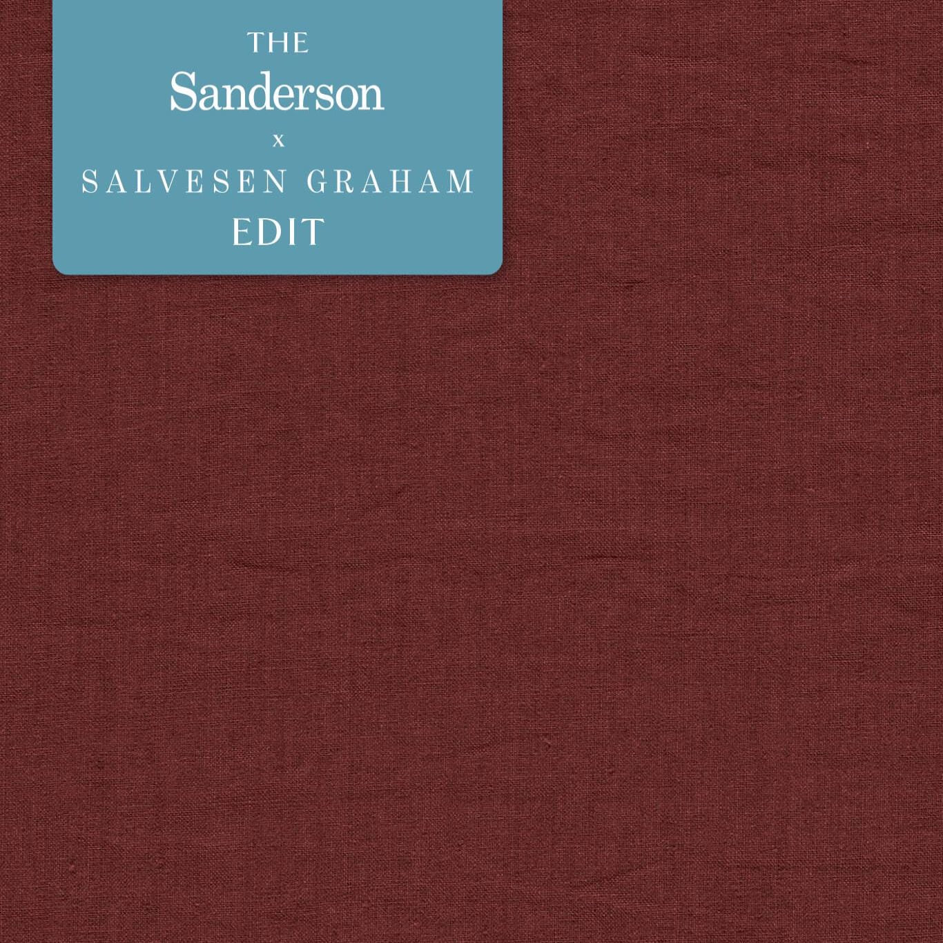 Wine-colored linen fabric swatch with a blue label.