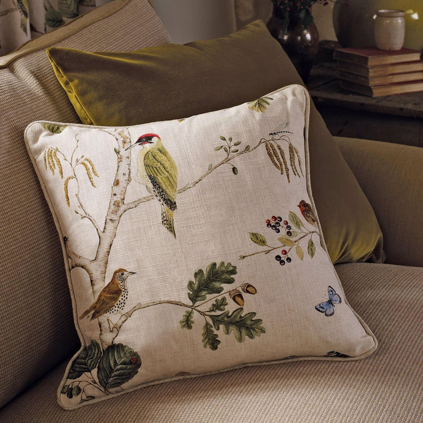 Sanderson Woodland Chorus Linen Multi fabric made of 80% viscose and 20% linen, featuring birds and botanical branches in soft neutral tones, ideal for upholstery, curtains, drapery, and cushions in classic and luxury interior design
