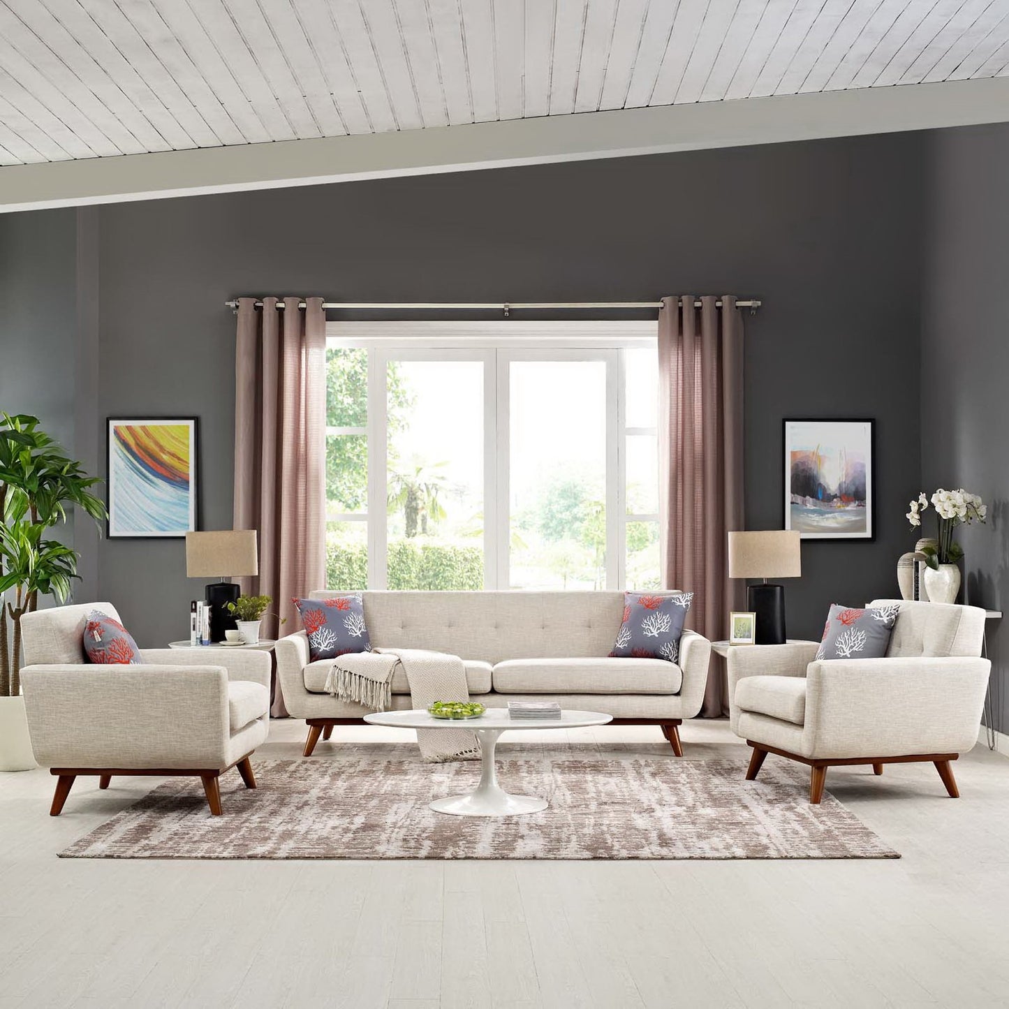 Beige fabric mid-century living room set: sofa, two armchairs with wooden legs, round white coffee table, neutral rug, gray walls.
