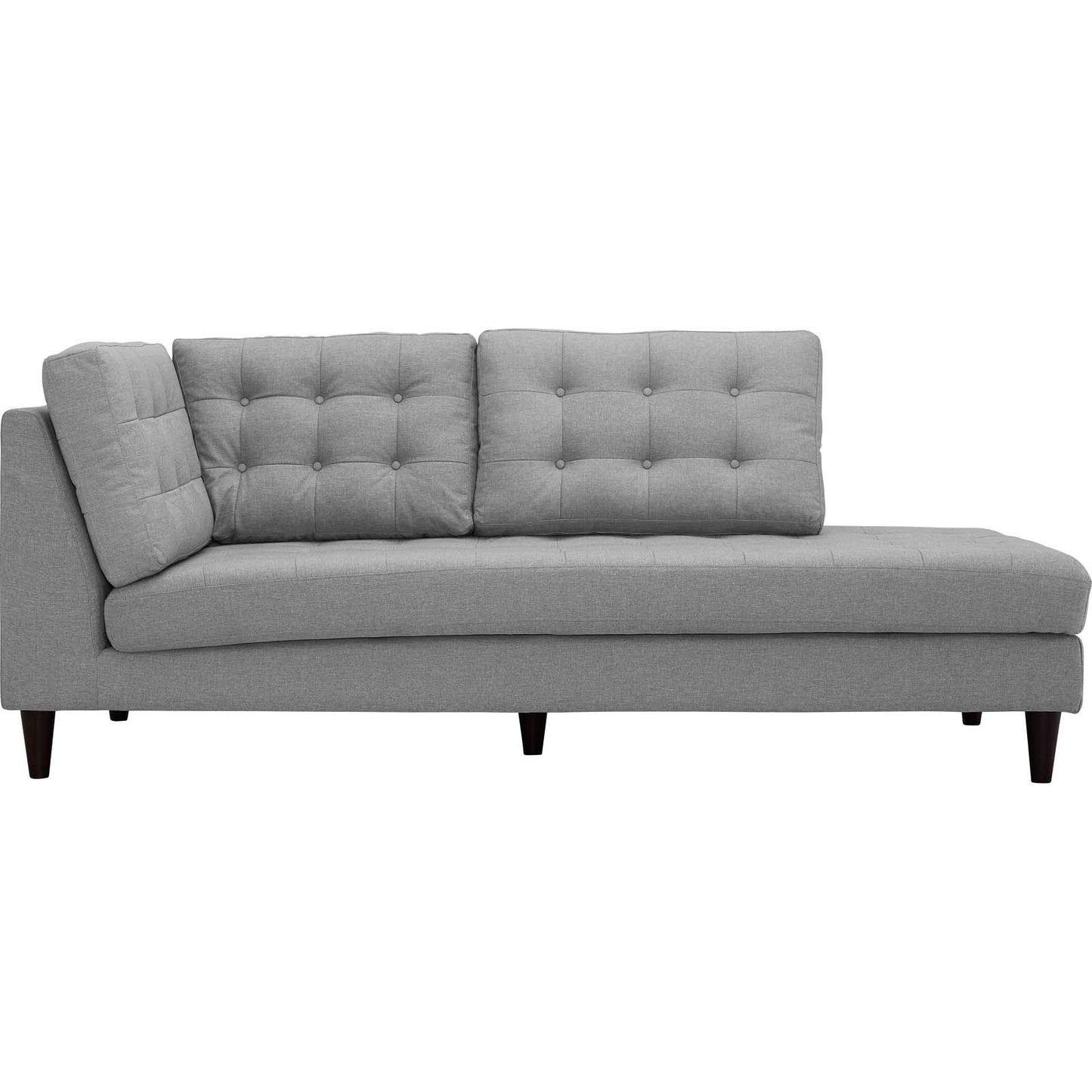 Light gray tufted fabric right-facing bumper module for a sectional, with low-profile legs in a contemporary living room style.