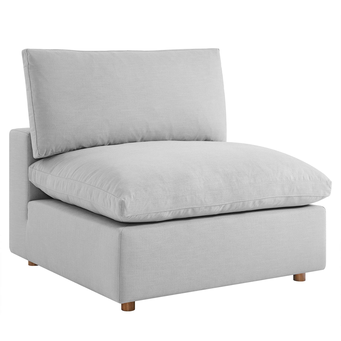 Light gray modular sectional sofa with down-filled, overstuffed cushions, low backs, and short wooden legs.