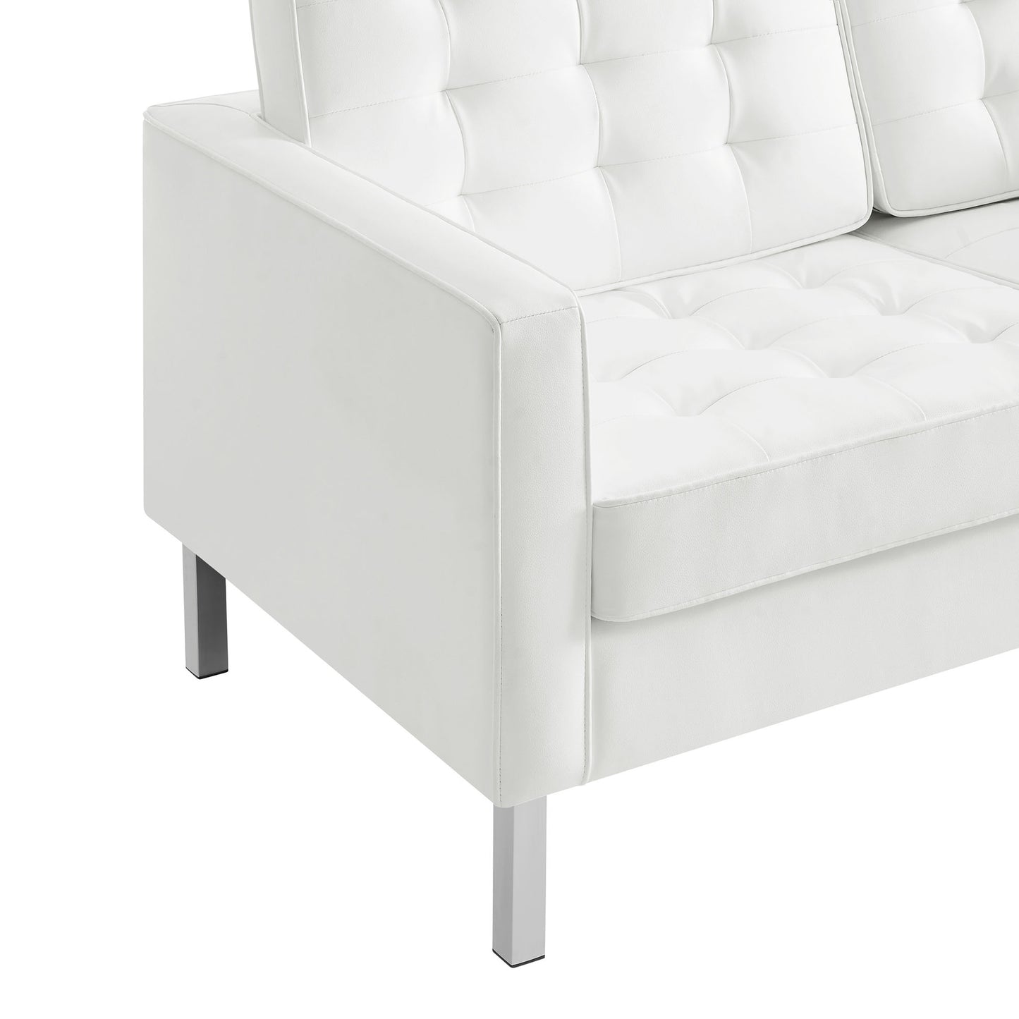 White tufted vegan leather loveseat with straight arms and square metal legs.