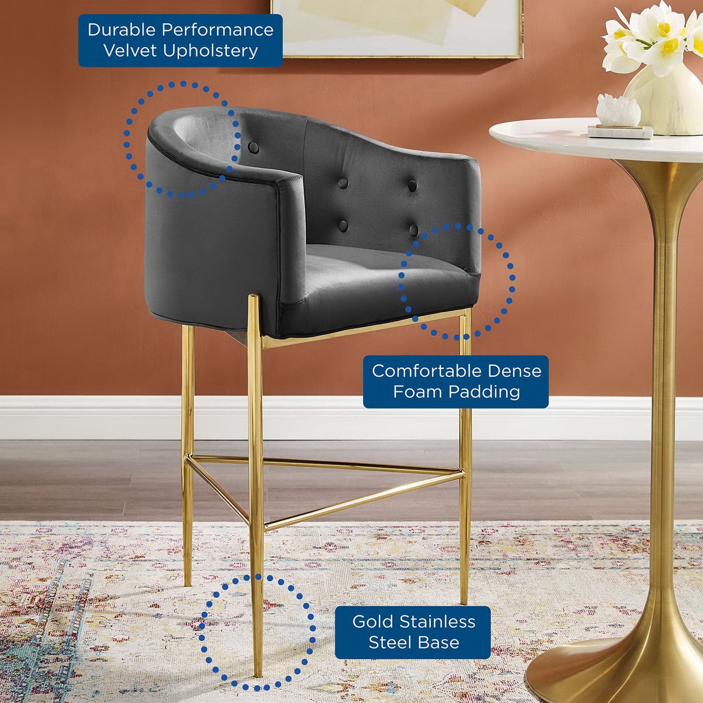 Charcoal velvet tufted bar stool with a metal frame, dense foam padding and a footrest.