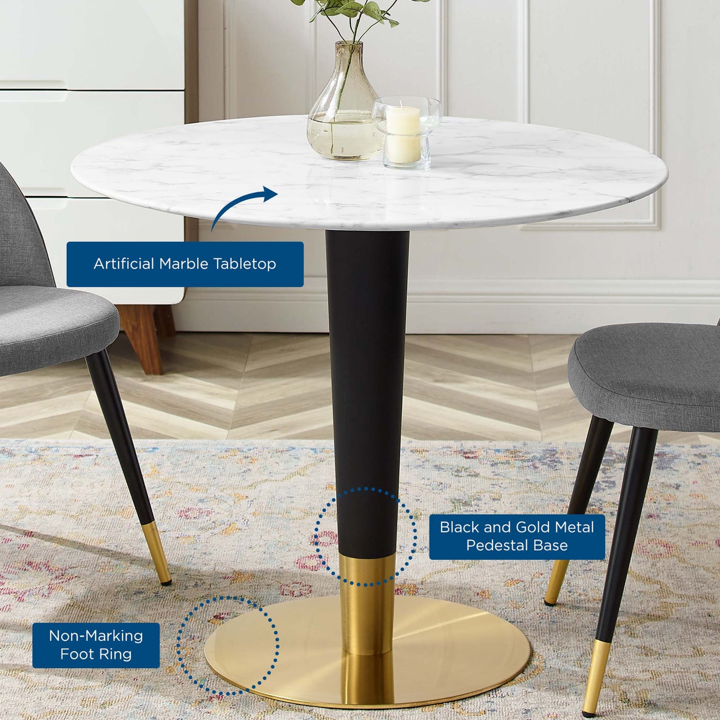 36-inch round artificial marble tabletop atop a black and gold pedestal with a gold circular base; non-marking feet, grey chairs nearby.