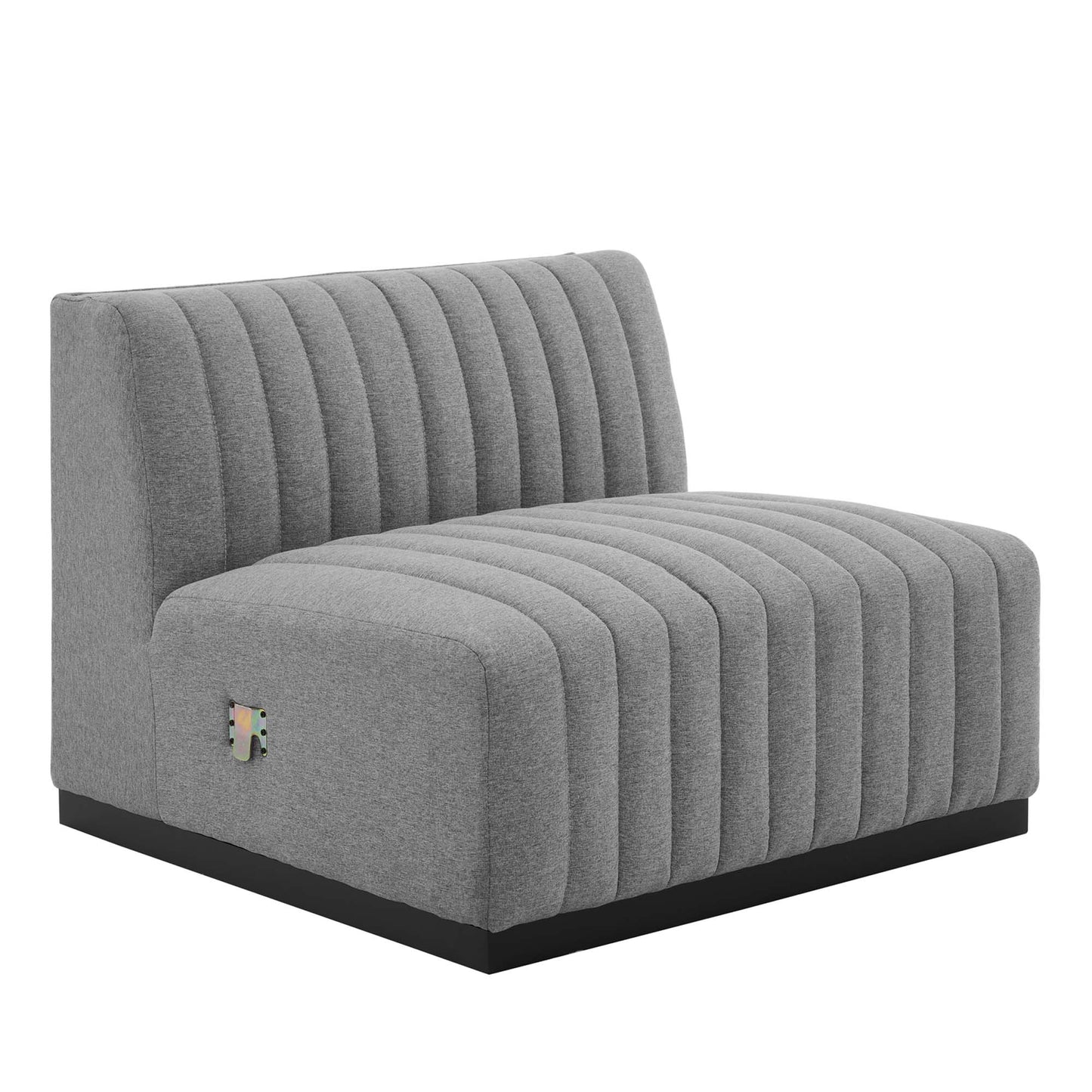 Gray fabric sofa with vertical channel tufting, left arm, low-profile black base.