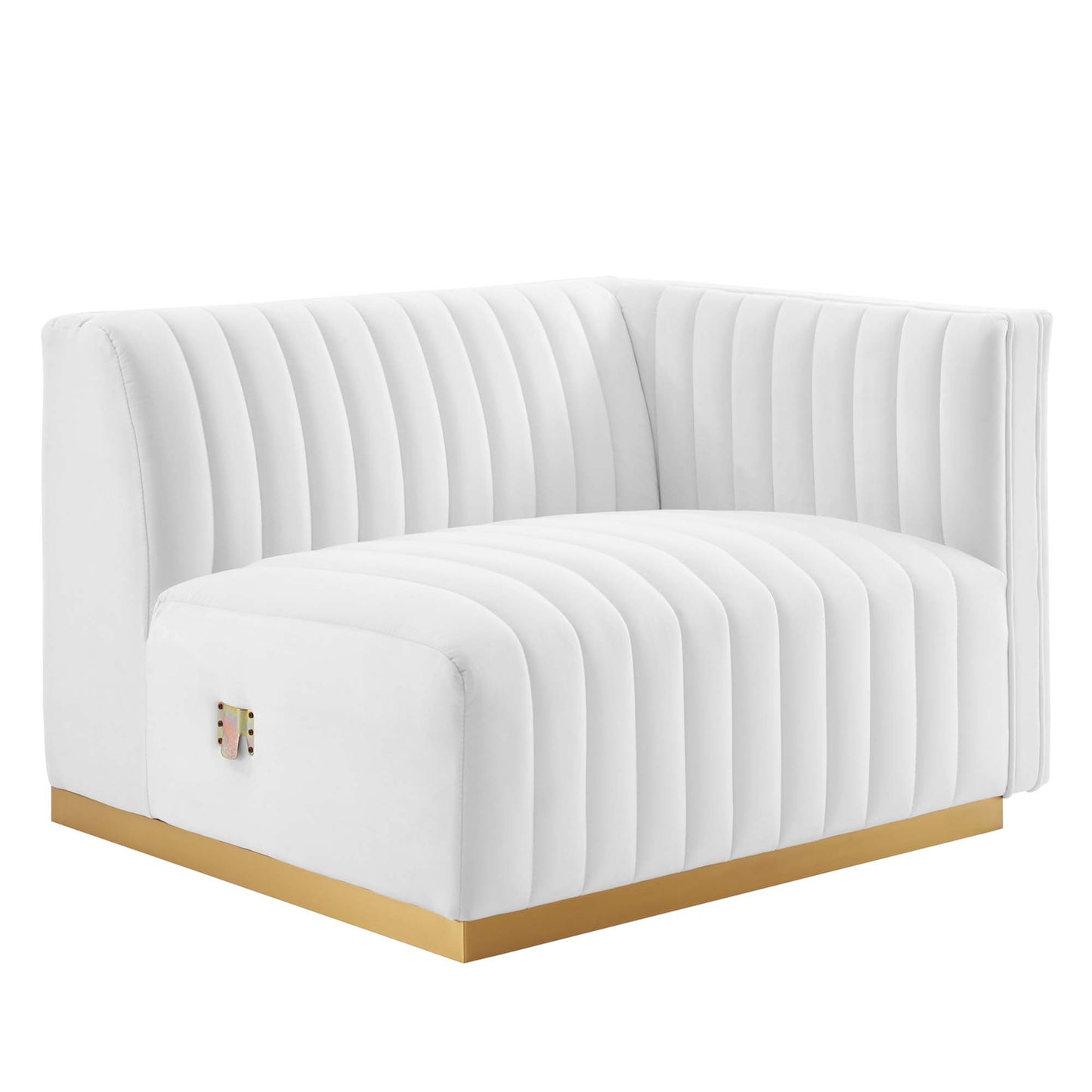 White tufted curved loveseat with vertical channel upholstery and gold base.