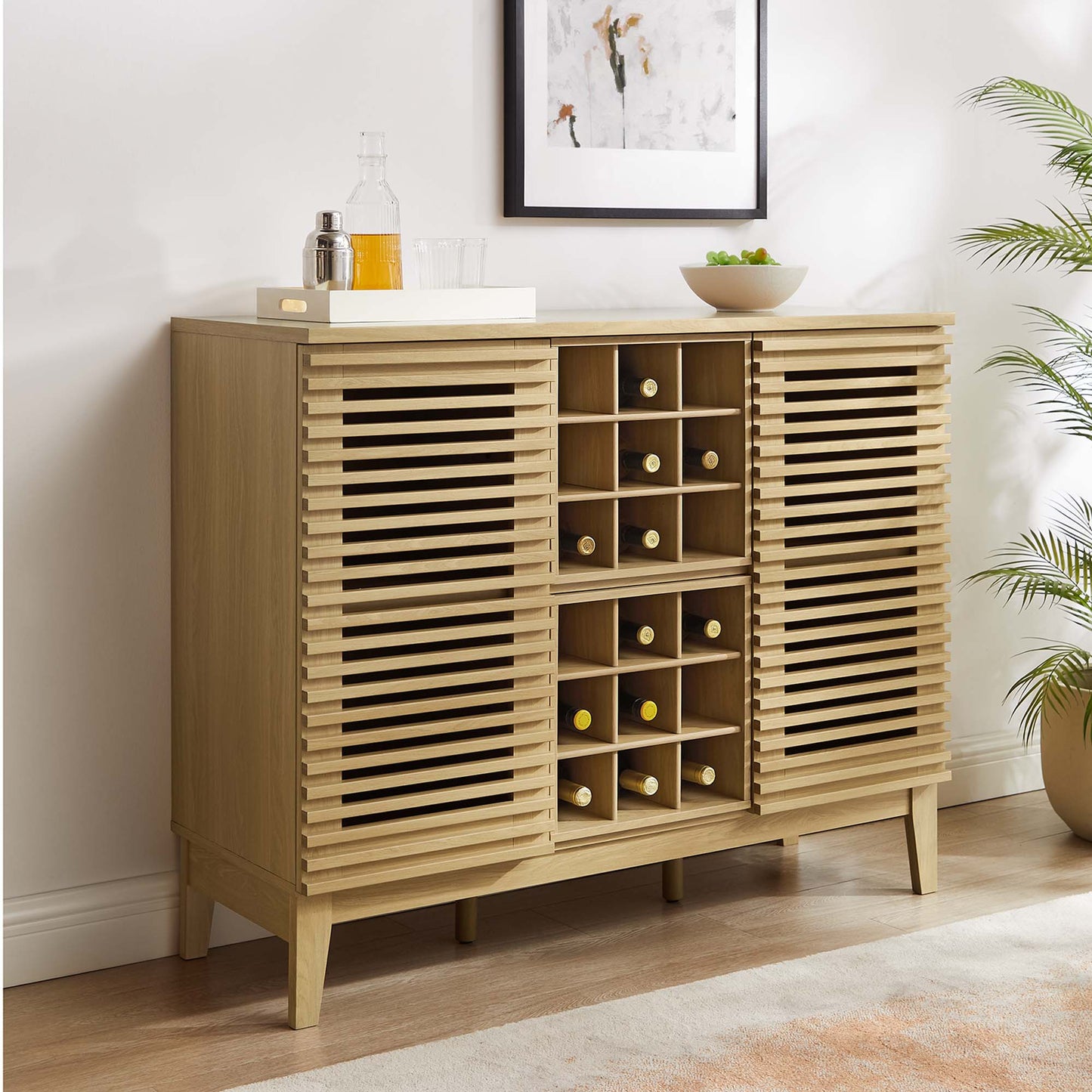 Natural oak bar cabinet with slatted doors and a central grid wine rack for bottle storage, in a mid-century modern style.